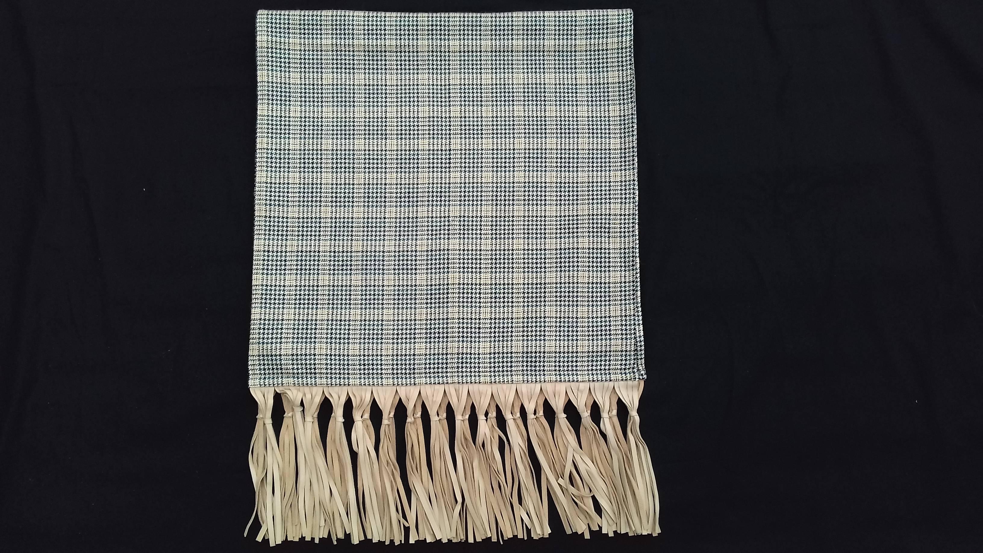 Stunning Authentic Vintage Hermès Scarf

For both men and women

Pattern: Glen plaid (Prince de Galles / Tartan Pattern with small and big houndstooth)

Made in France

Made of 58% Wool and 42% Silk

Calf leather fringes at the ends

Colorways: