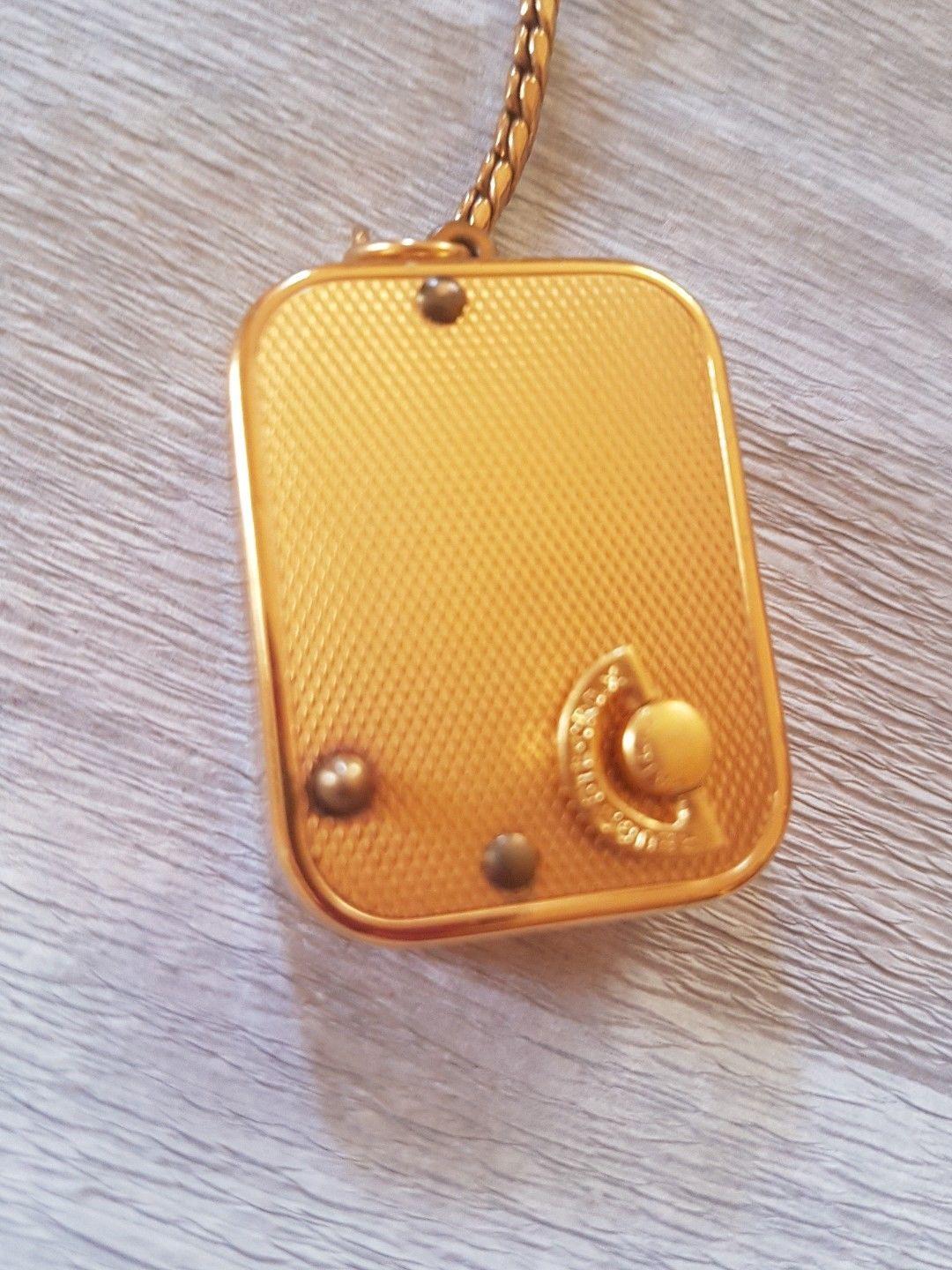 Rare Authentic Hermes Keychain

It is also a music box !

Turn the mecanic key (at the back) clockwise and go up the small button to hear the music 

Made by Reuge, seller of music boxes, located in Sainte Croix, Swiss

