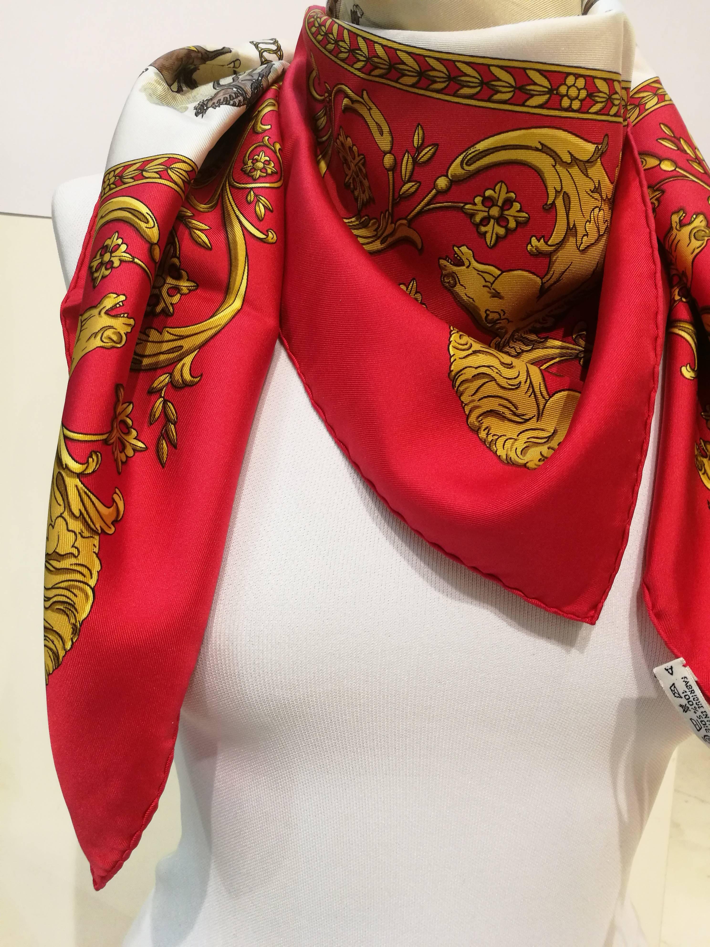 HERMES Silk La Promenade de Longchamps By Philippe Ledoux Scarf 90 
This is a sophisticated silk Hermes square scarf that features a circular arrangement of horse and carriages. Each of the designs are fascinating and it is an original and