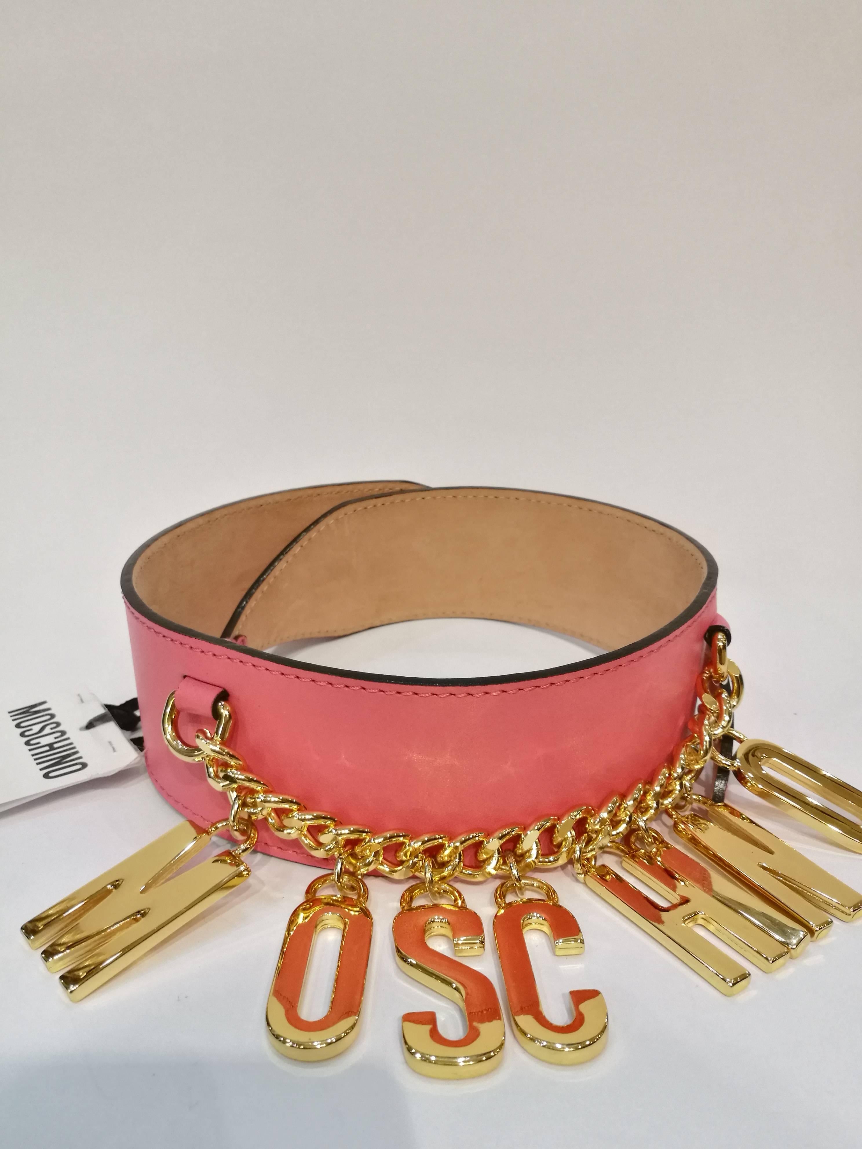 Moschino Pink Belt NWOT
Pink leather belt with gold tone Moschino logo
Italian size range 38