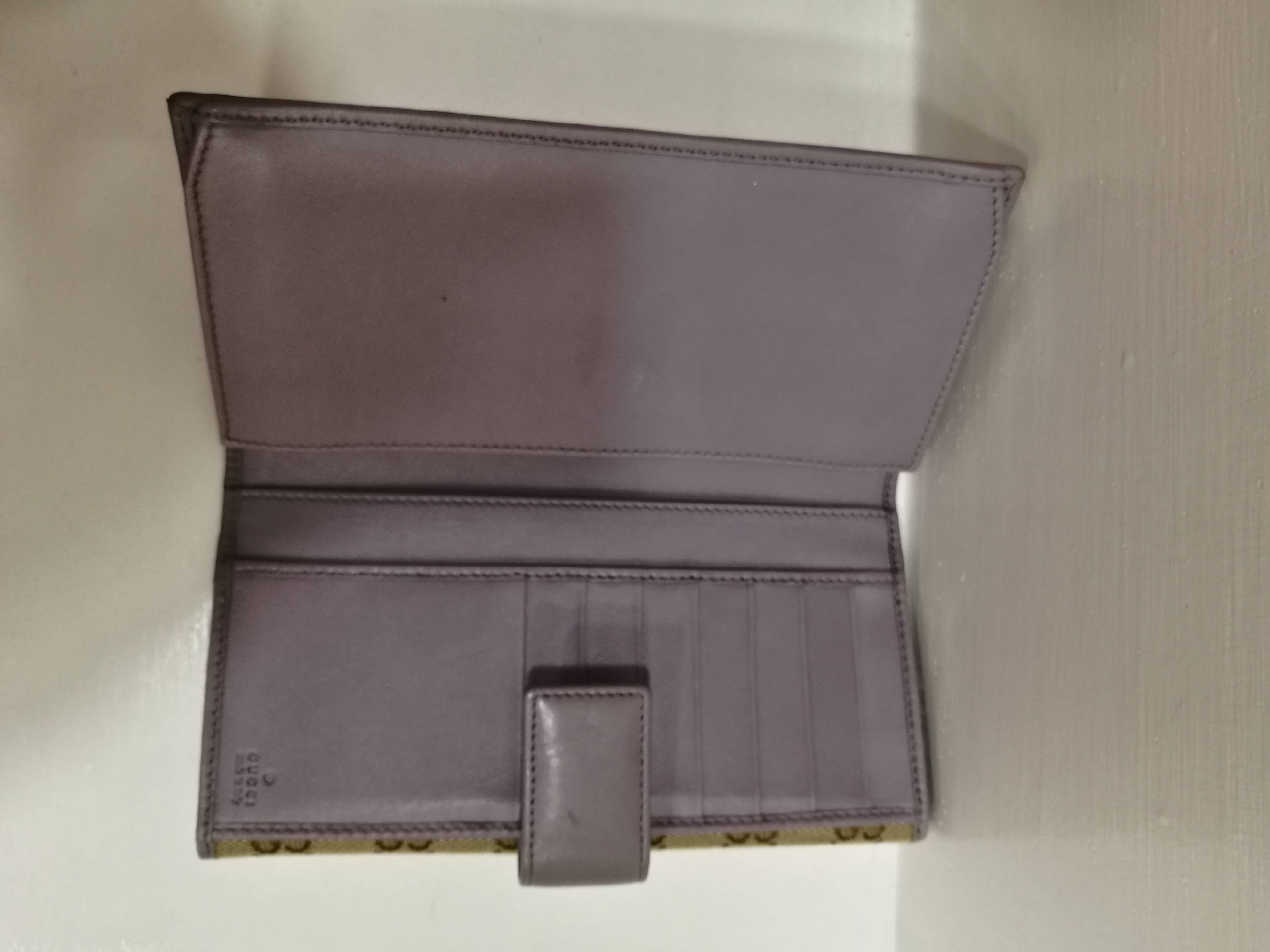 Gucci Wallet NWOT
Monogram textile light purple leather wallet still with box