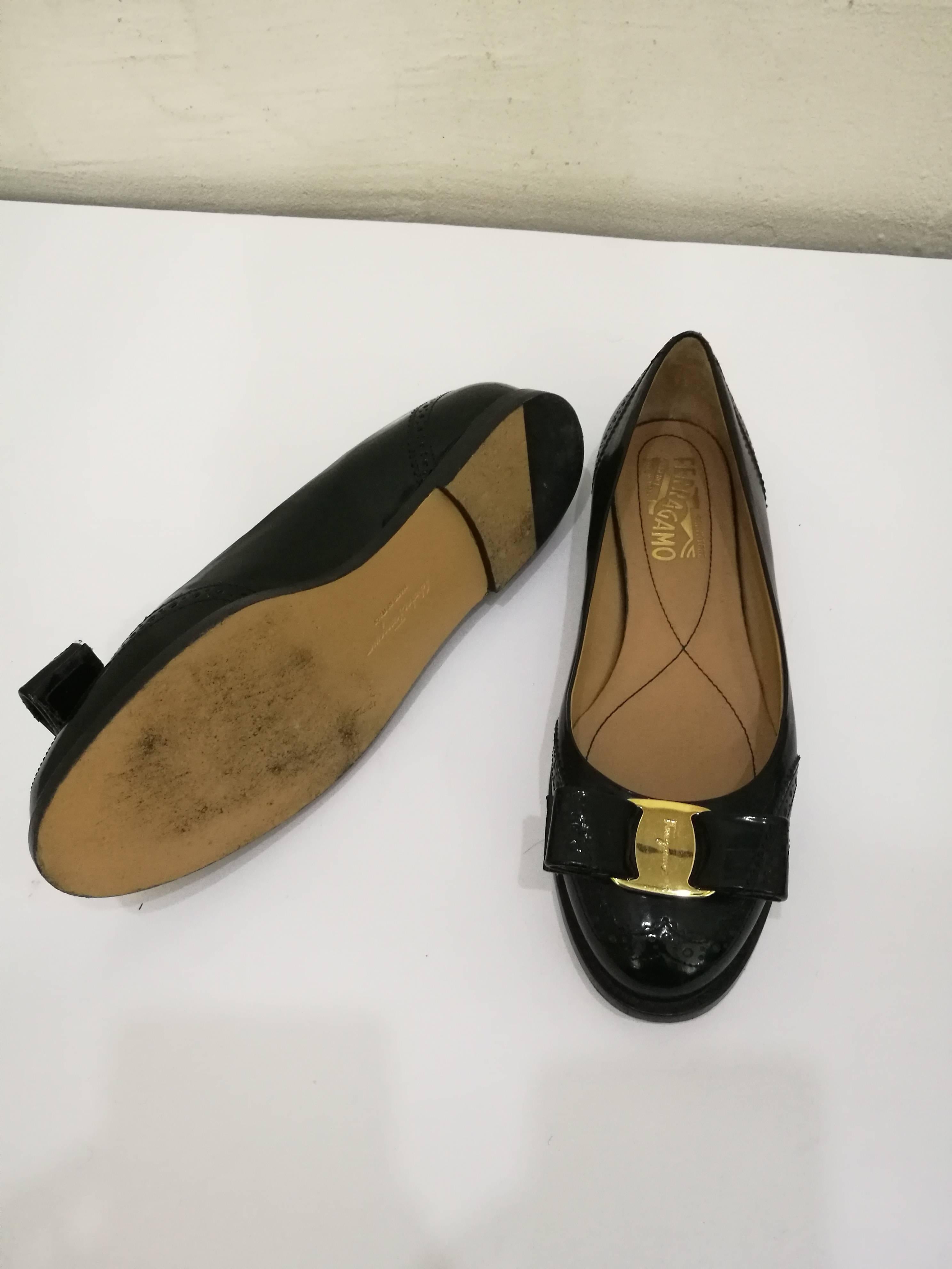 Salvatore Ferragamo Black Ballerinas with gold tone hardware
Totally made in italy in size 36