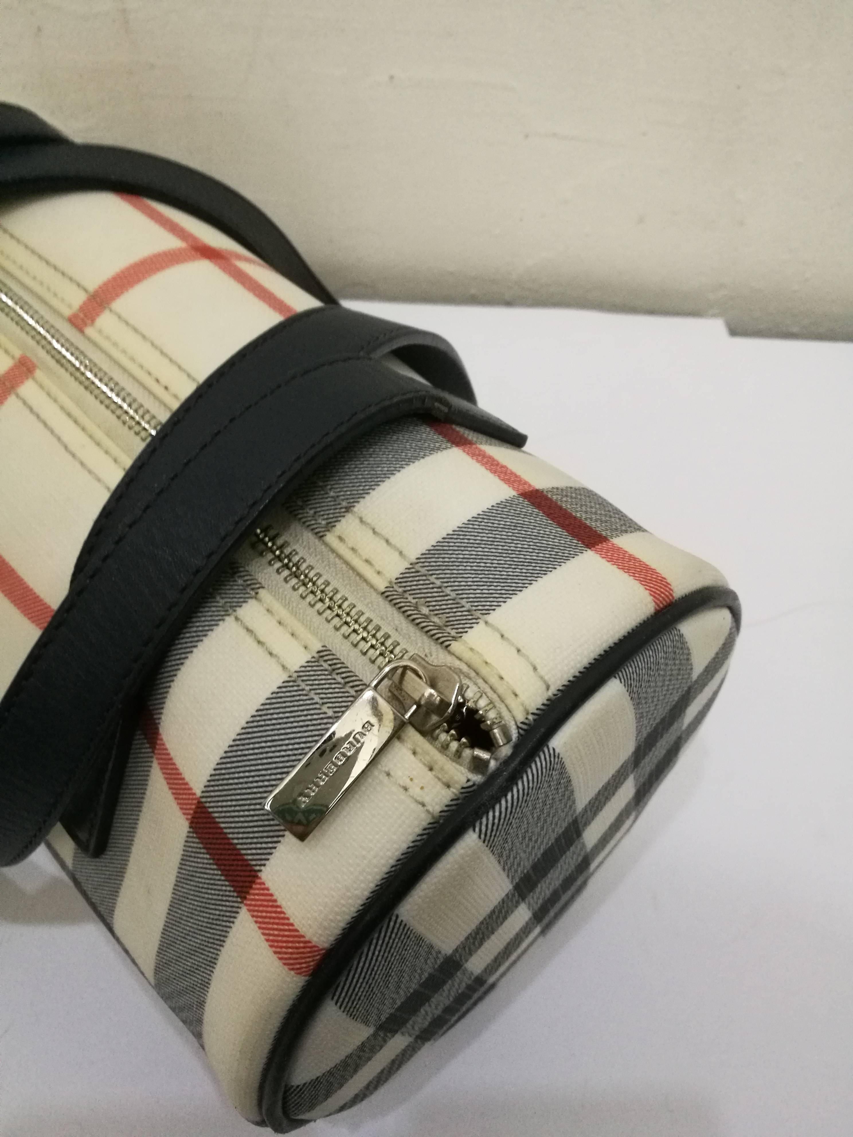 Burberry Papillon Bag
cream, black and red tone leather 'House Check' shoulder bag from Burberry.