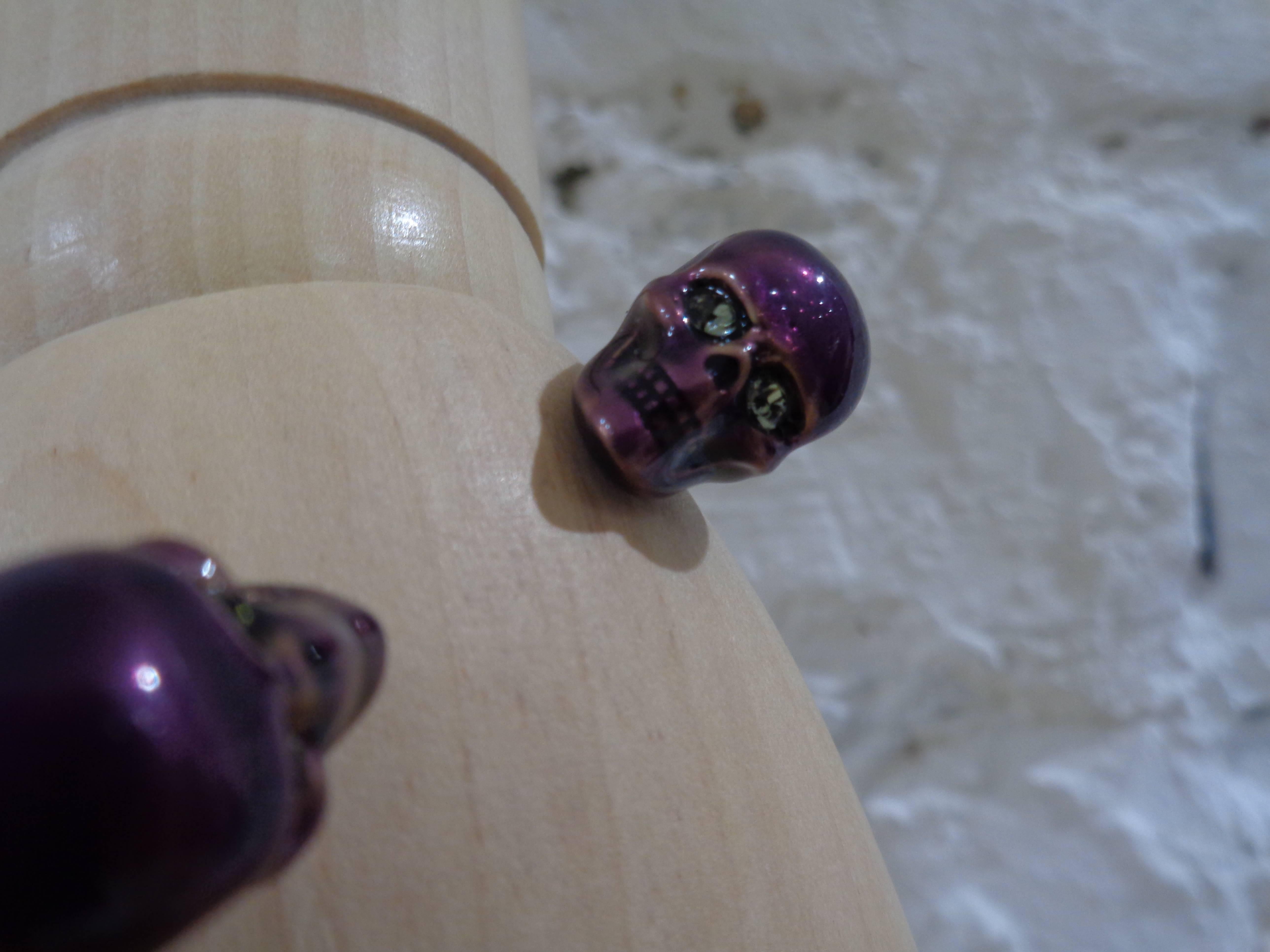 Alexander McQueen gold tone purple skull bracelet
