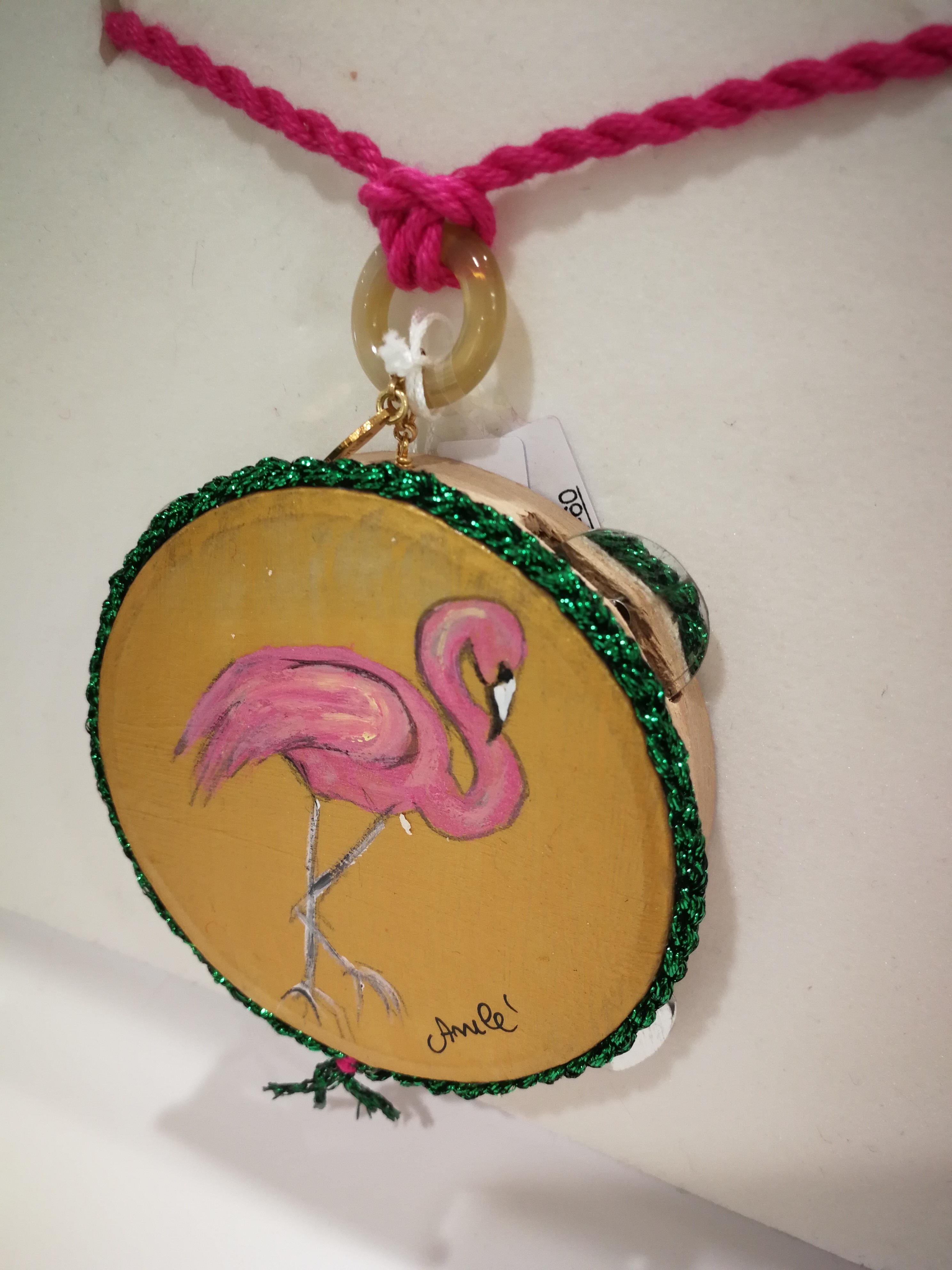 Amlé Handmade Tambourine Flamingo Necklace

Handmade and handpainted flamingo necklace

Tambourine measurements: 7 x 7 cm 