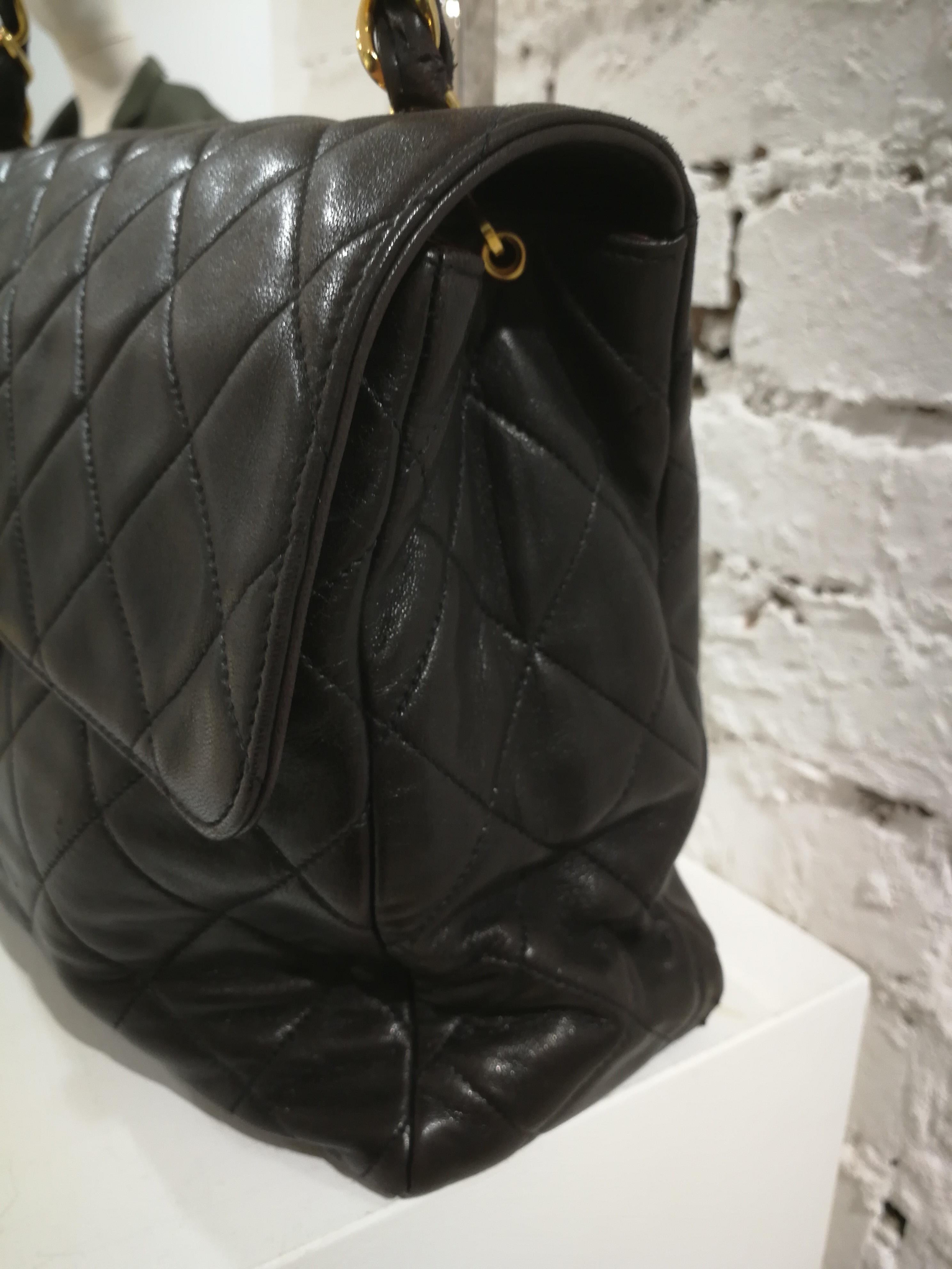 1990s Chanel Black Leather Jumbo Shoulder Bag
Soft lamb skin leather, bordeaux tone inside 
outside pocket
inside pocket
gold tone hardware
