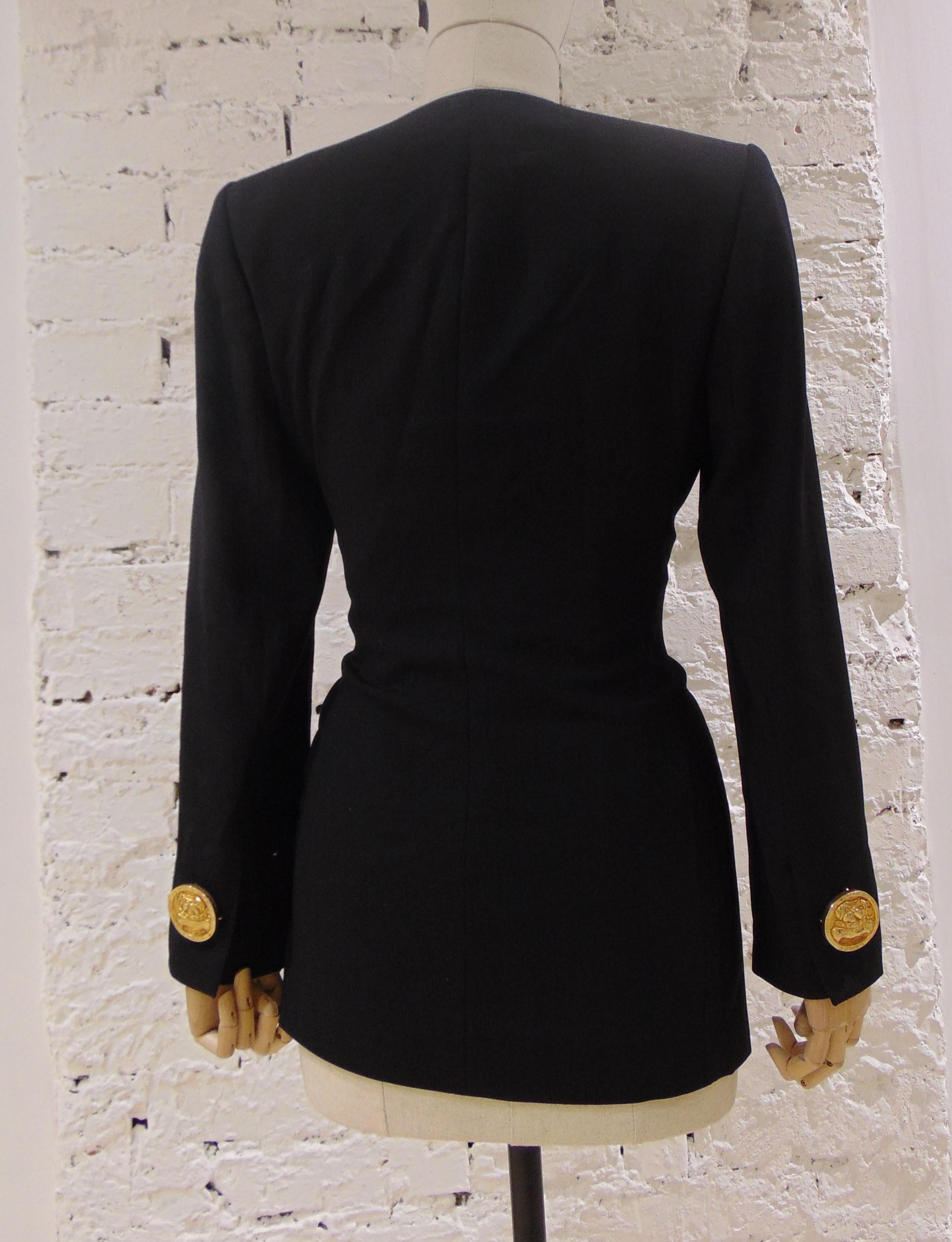 Rena Lange Black Jacket
Black jacket embellished with gold tone bottons on the fronts
totally made in italy in size 42
