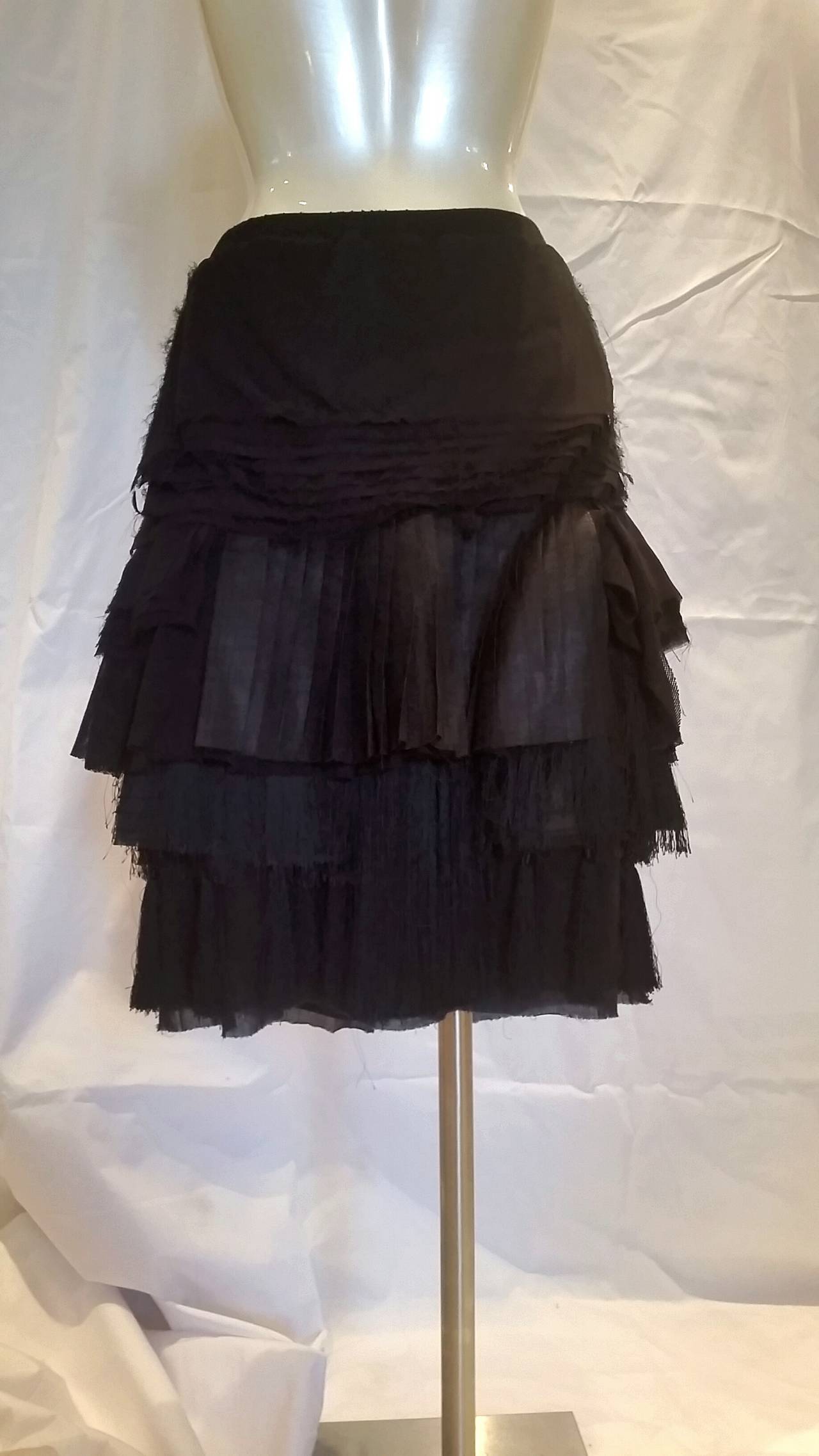 1990s Givenchy vintage black Skirt with fringes. Still with Original Tags
100% cotton