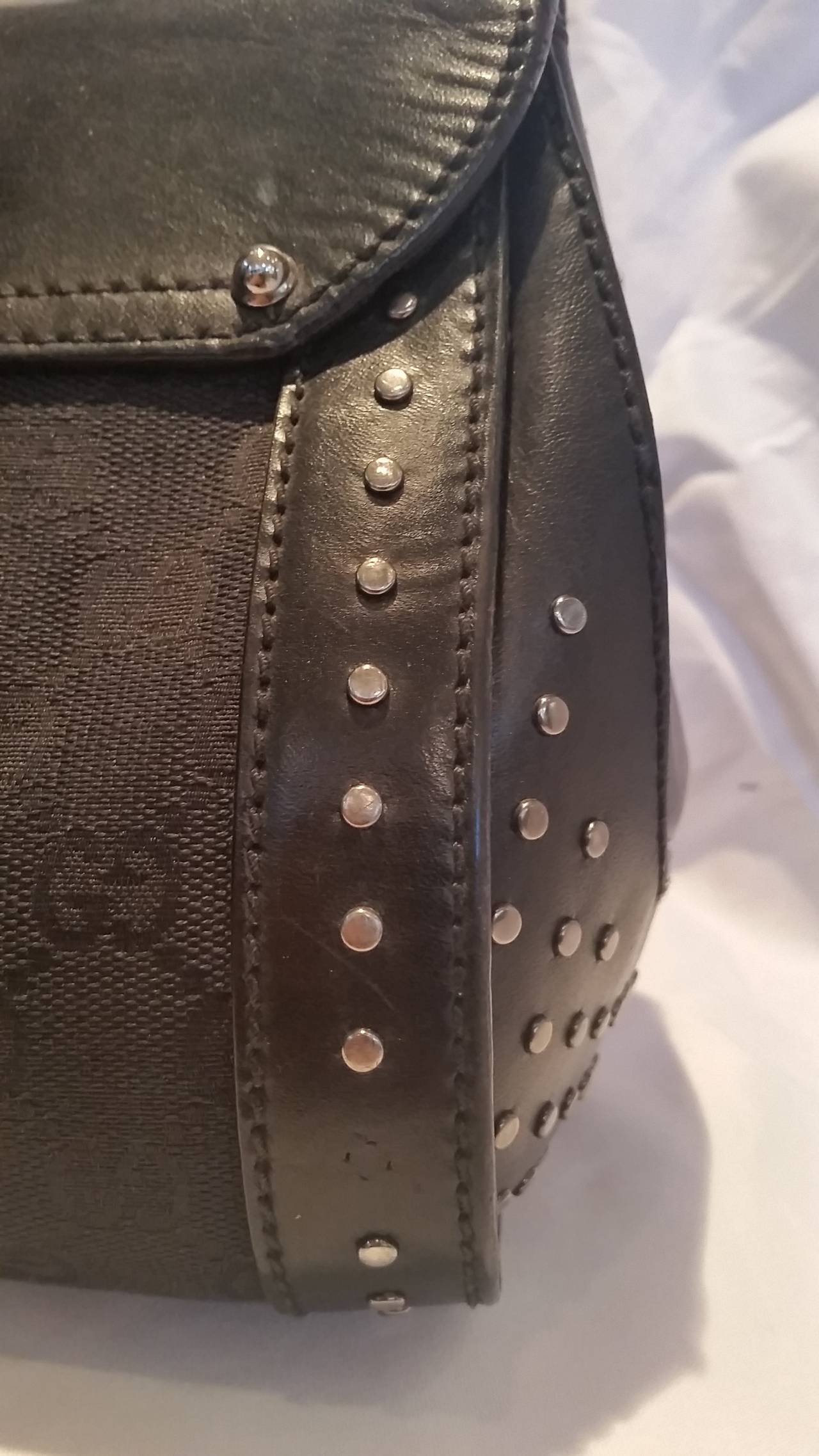 Women's 2000s Gucci black leather bullet with bamboo and studs