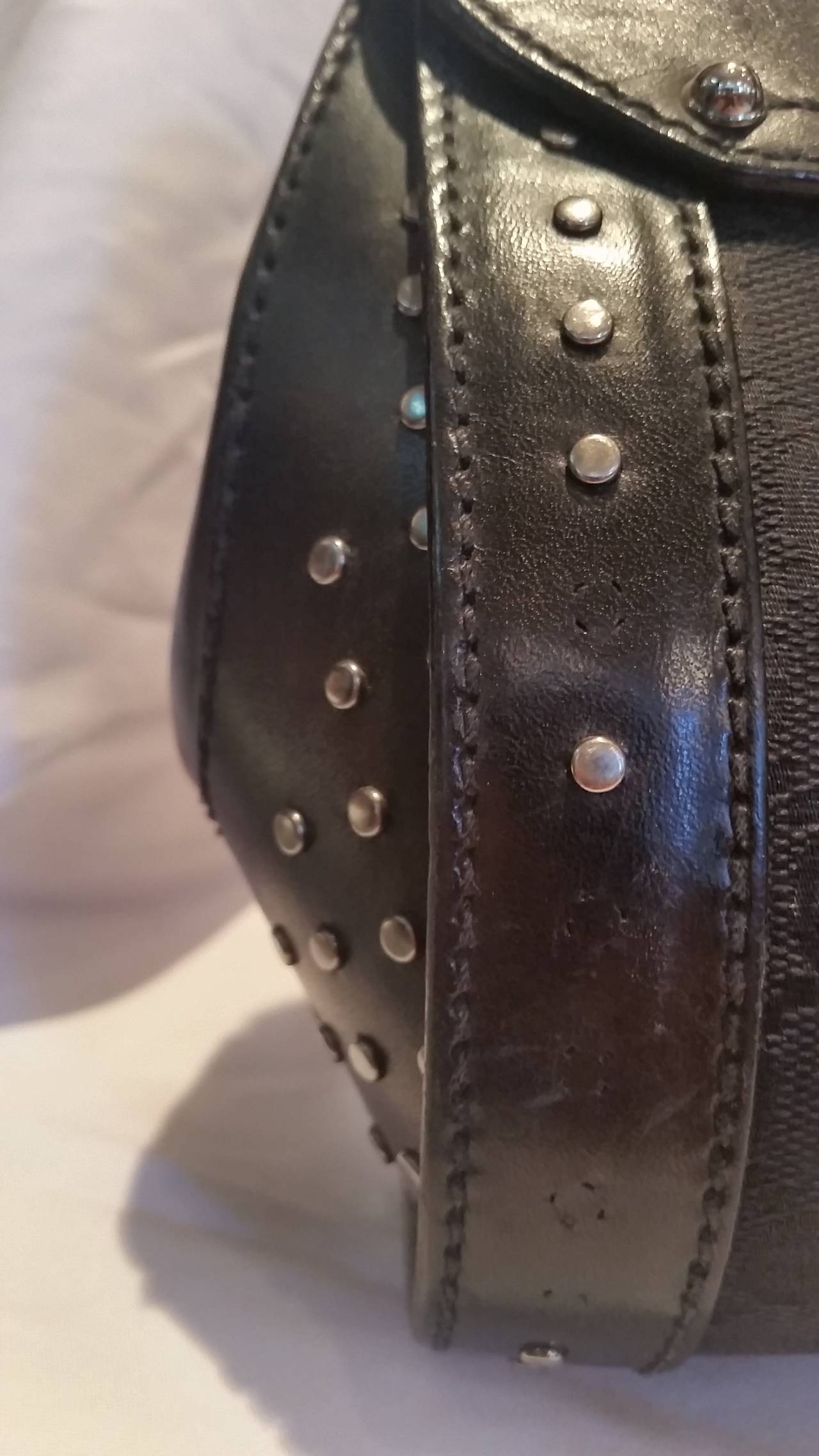 2000s Gucci black leather bullet with bamboo and studs at 1stDibs