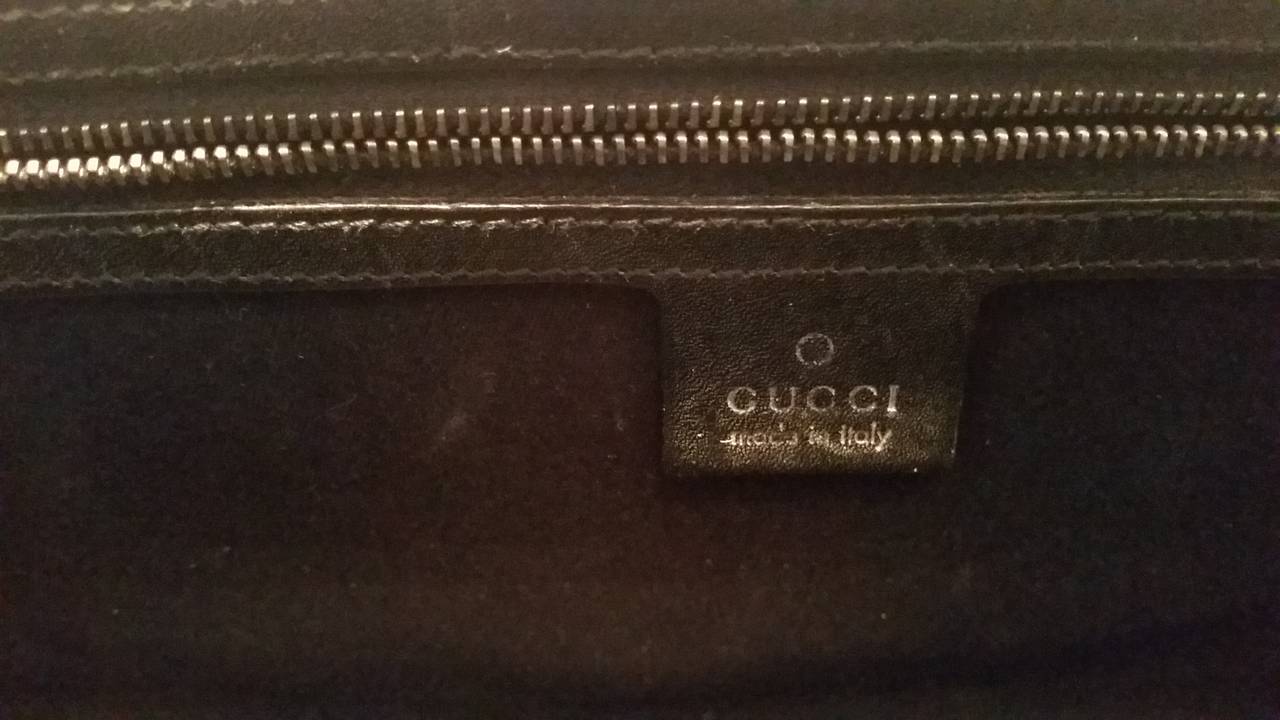 2000s Gucci black leather bullet with bamboo and studs 1