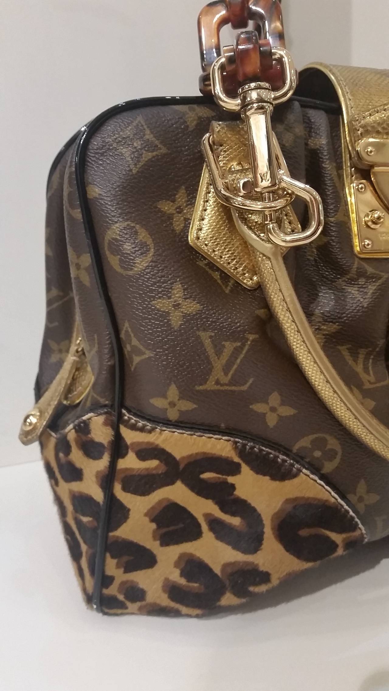 Louis Vuitton Monogram Canvas, Leopard Calfhair and Karung Trimmed Adele Bag
