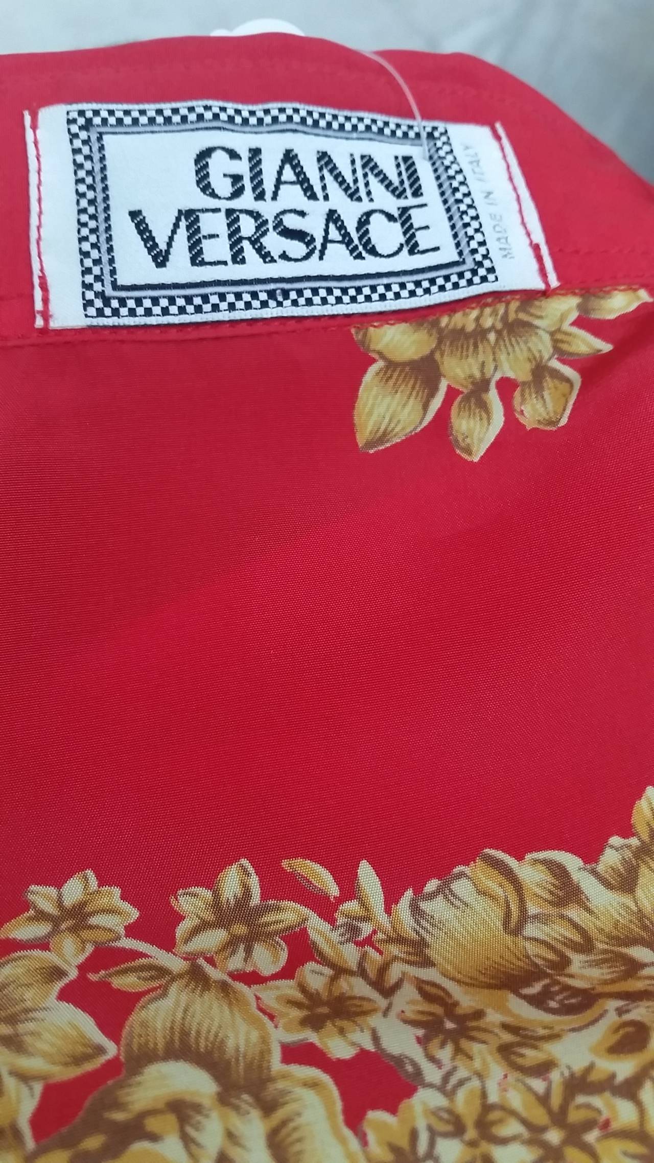red and gold versace shirt