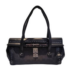 2000s Gucci black leather bullet with bamboo and studs
