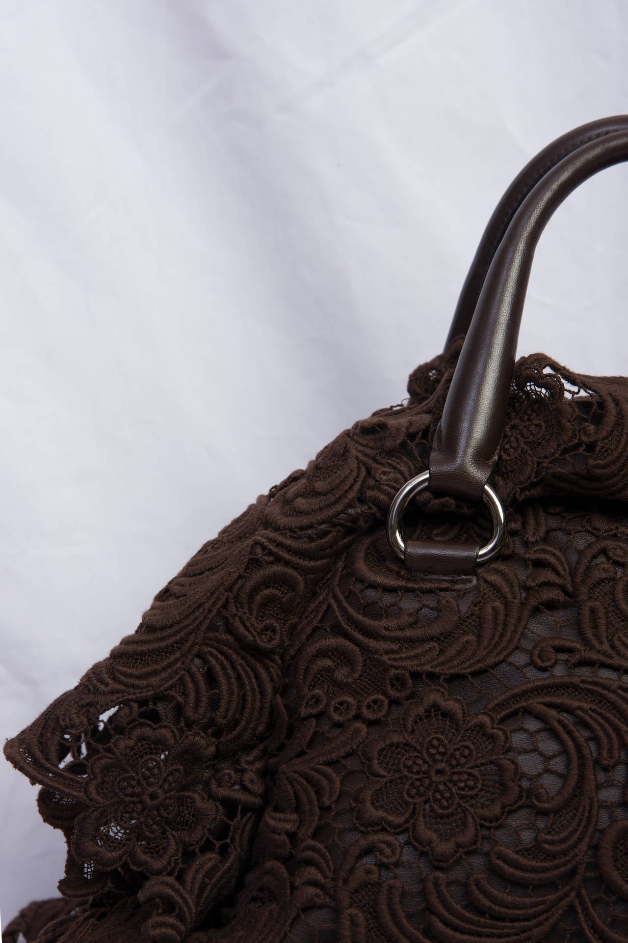 2007s Prada Pizzo Lace Covered Leather Bowling Bag in Brown.