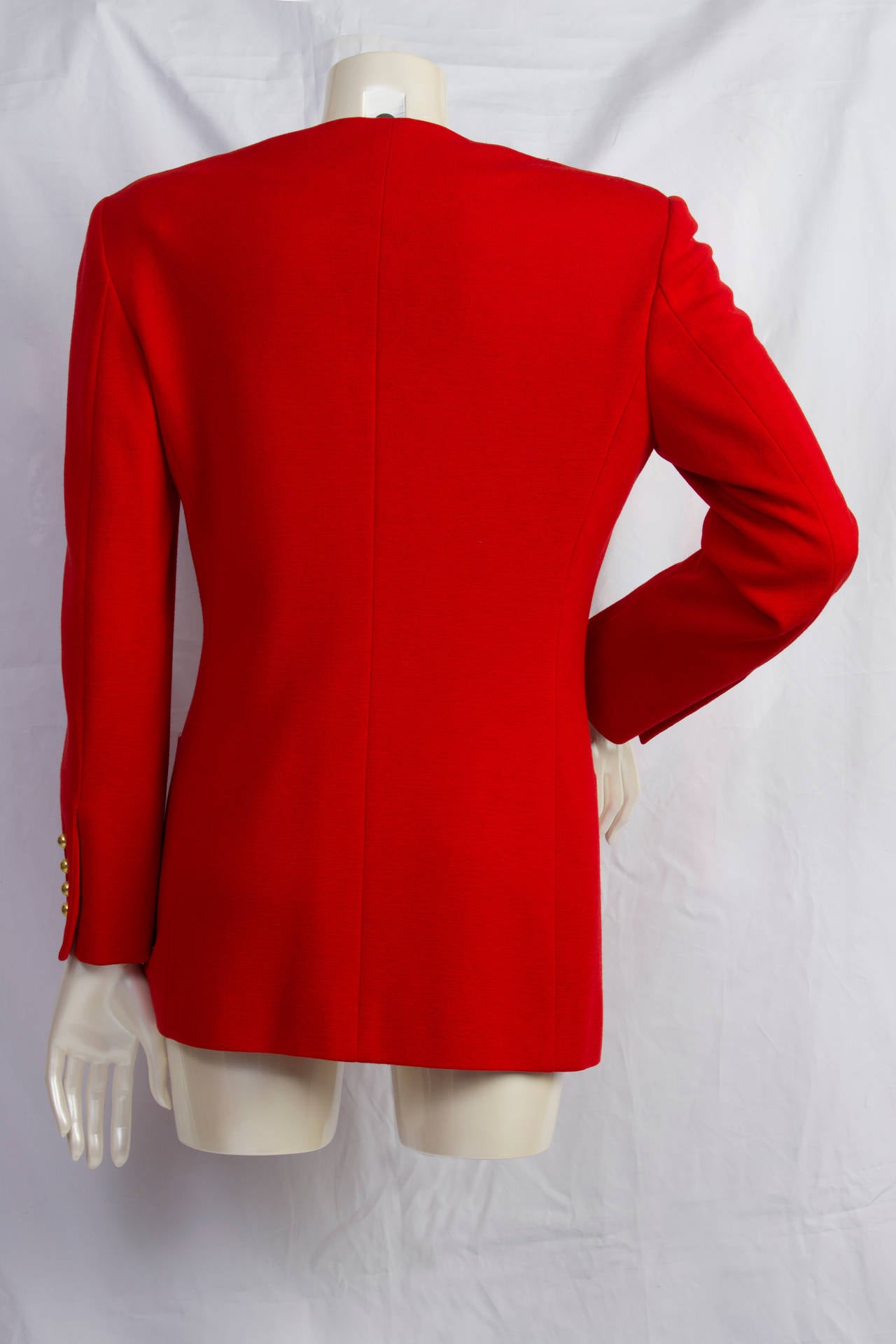 1980s Moschino Couture red jacket with gold bottons.