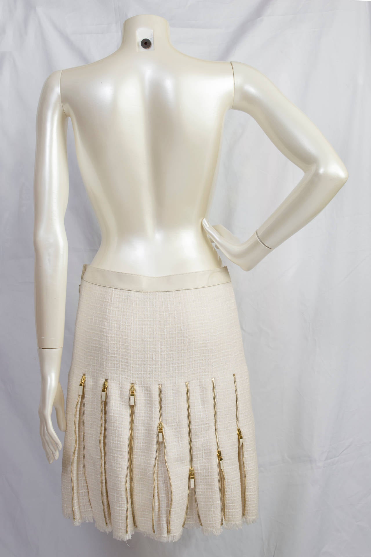 2000s Alexander McQueen White skirt with gold zips.