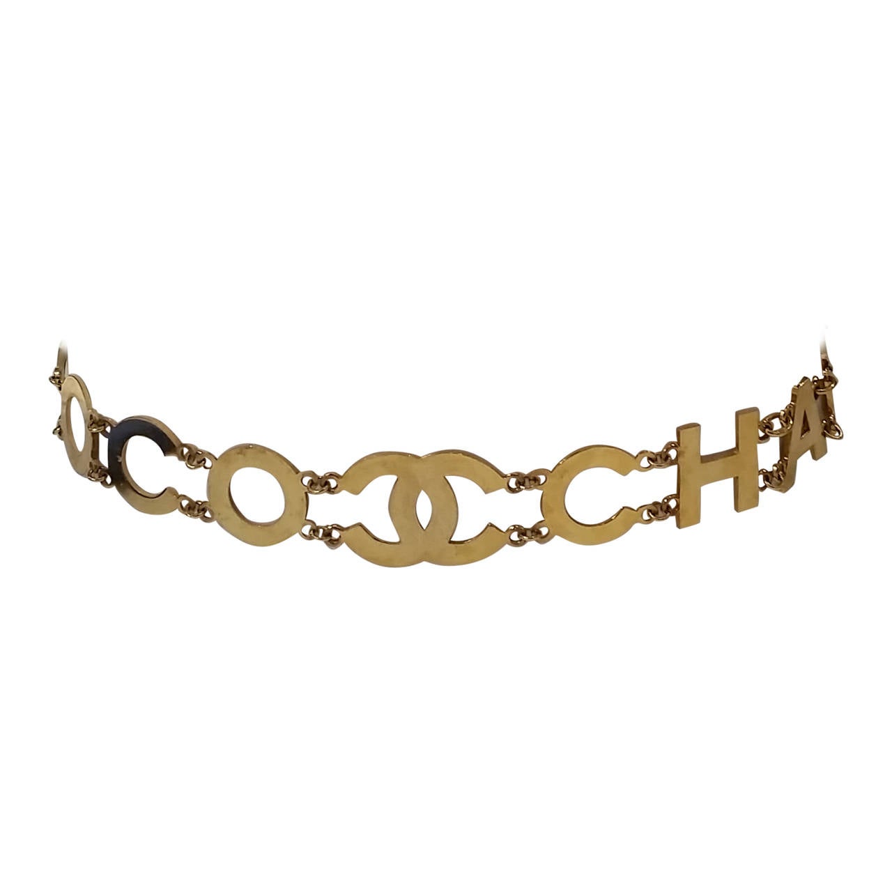 1980S Chanel Rare black and gold belt
Coco CC Chanel gold logo black belt