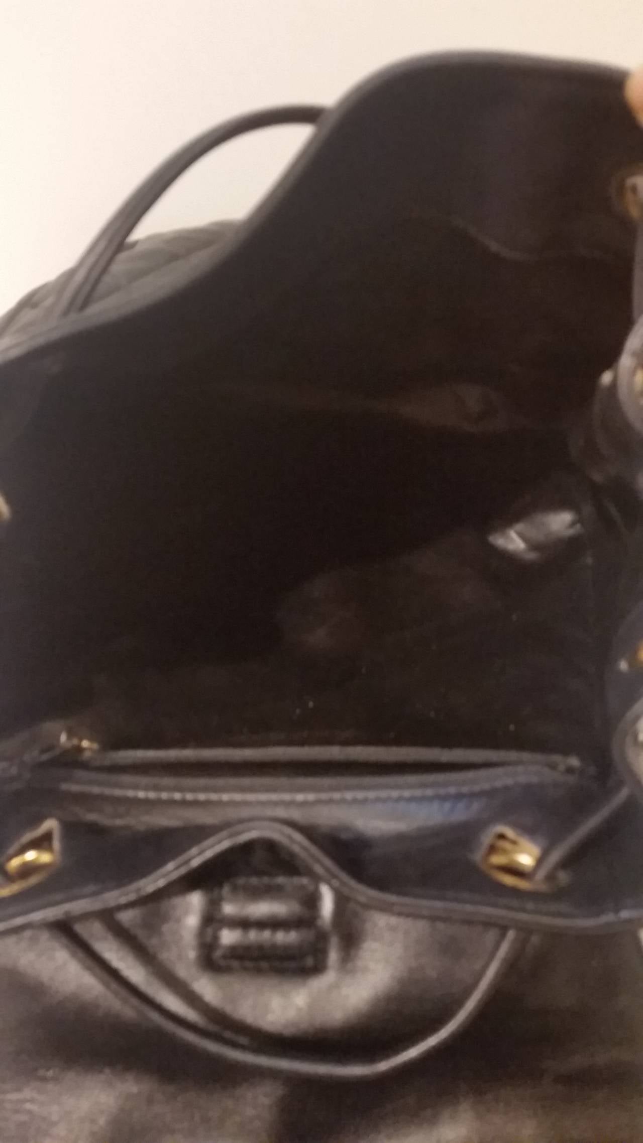 Women's 1980s Chanel black leather backpack