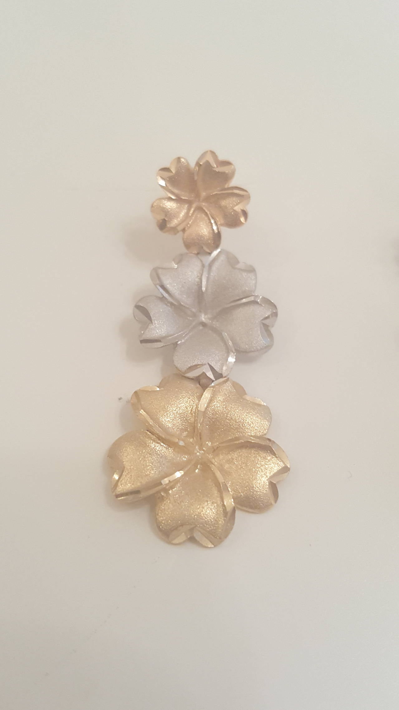 2000s 18k yellow, white and rose gold flower earrings.