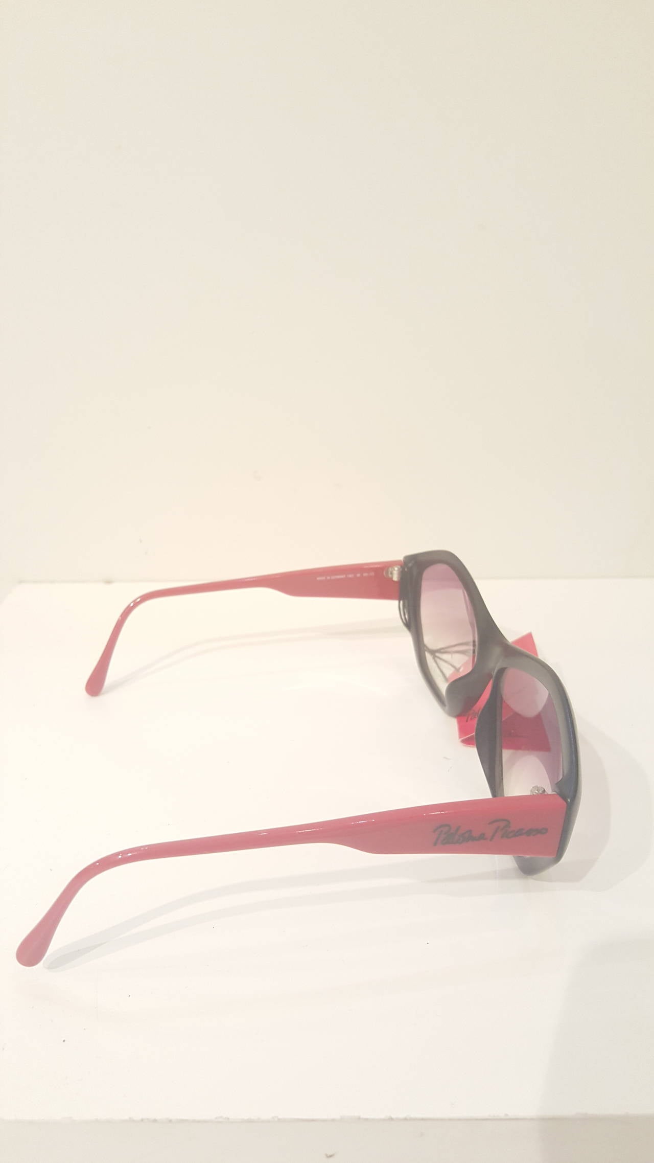 Beige 1980s Paloma Picasso black and red sunglasses
