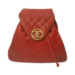 Vintage 1986s Chanel red backpack with gold hardware