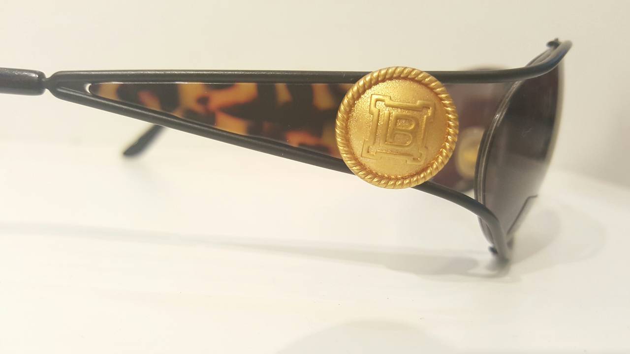 1980s Laura Biagiotti black gold and tortoise sunglasses with logos on both sides