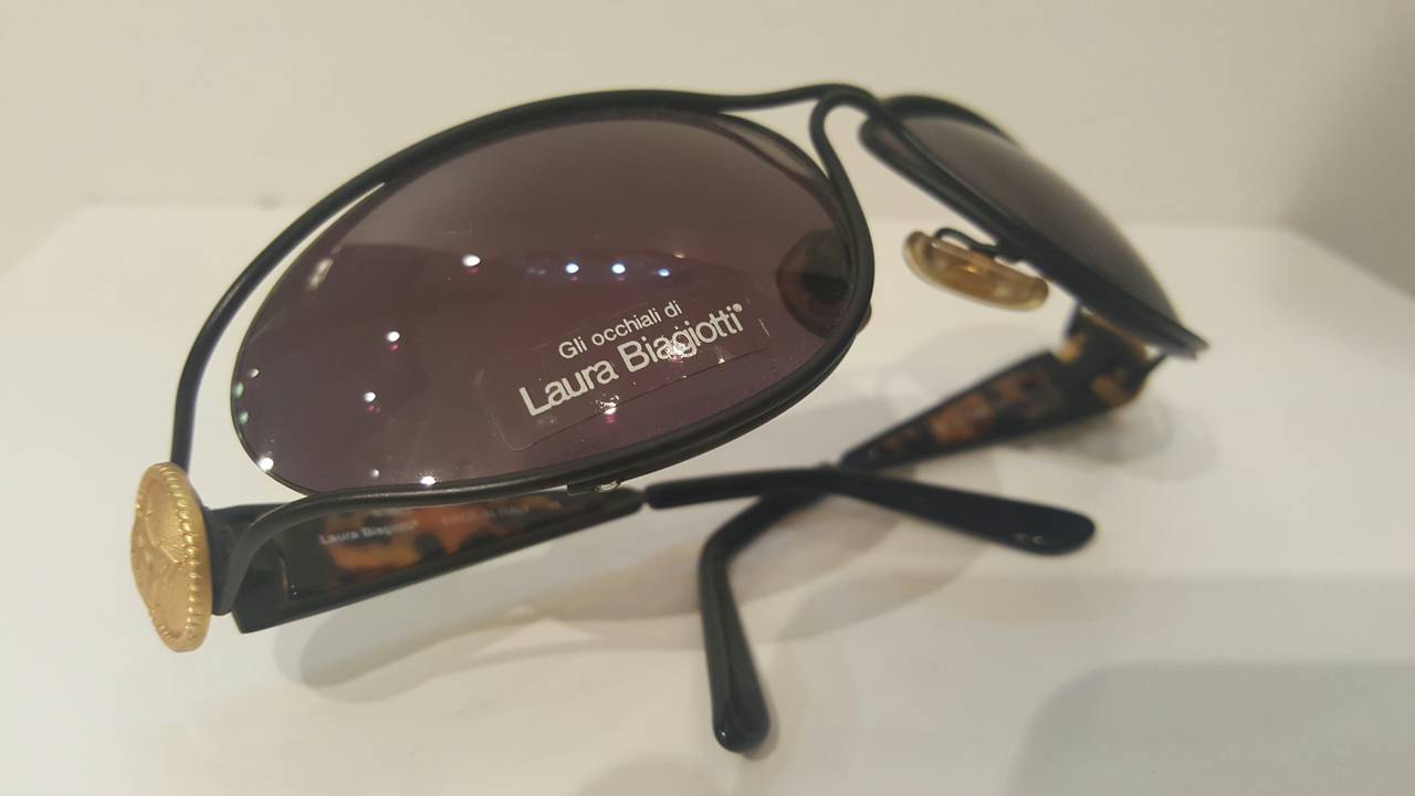 Gray 1980s Laura Biagiotti black gold and tortoise sunglasses