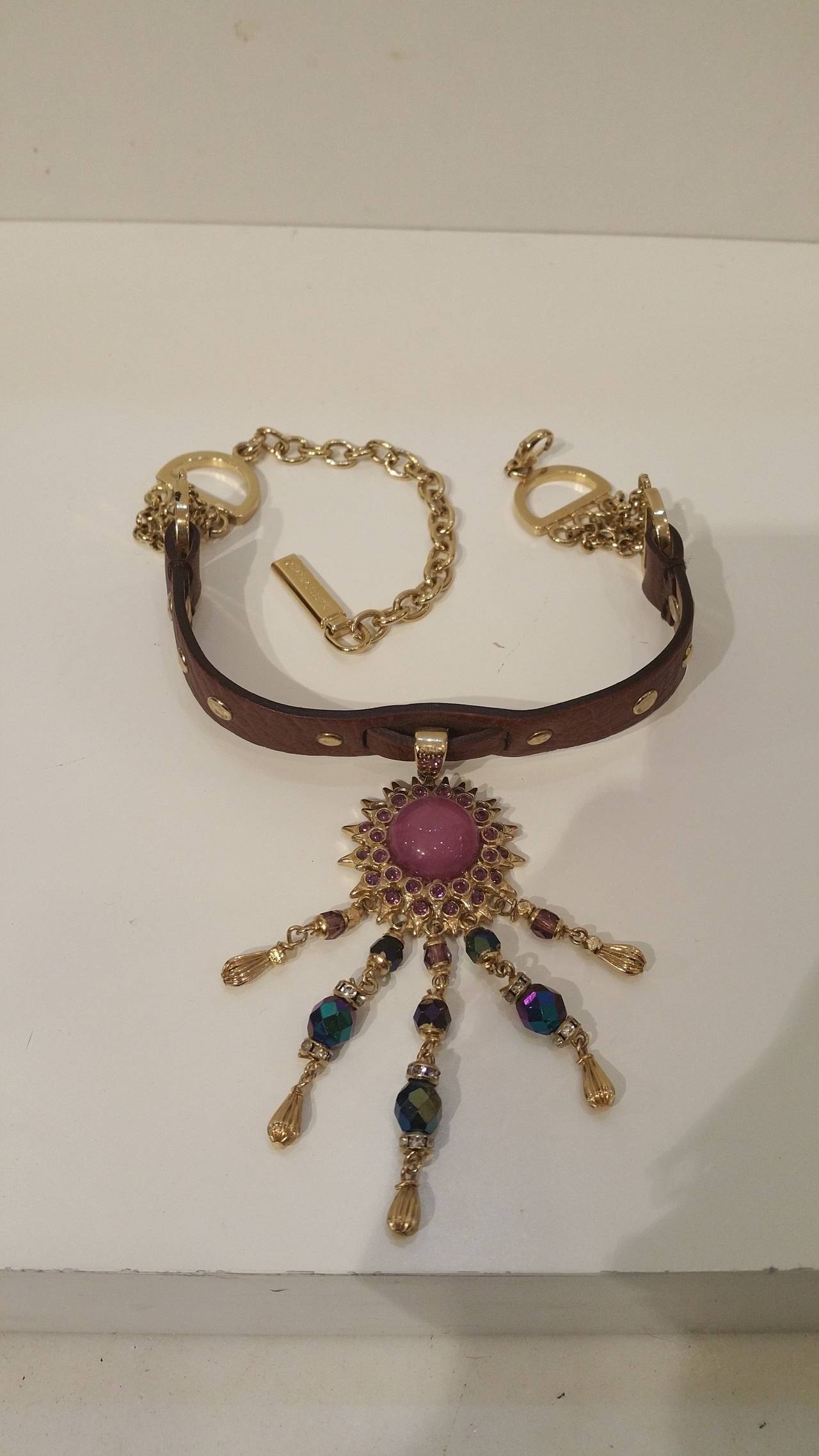 1980s Dolce & Gabbana multicolour collar with multi stones. All around the neck is brown leather. Gold hardware