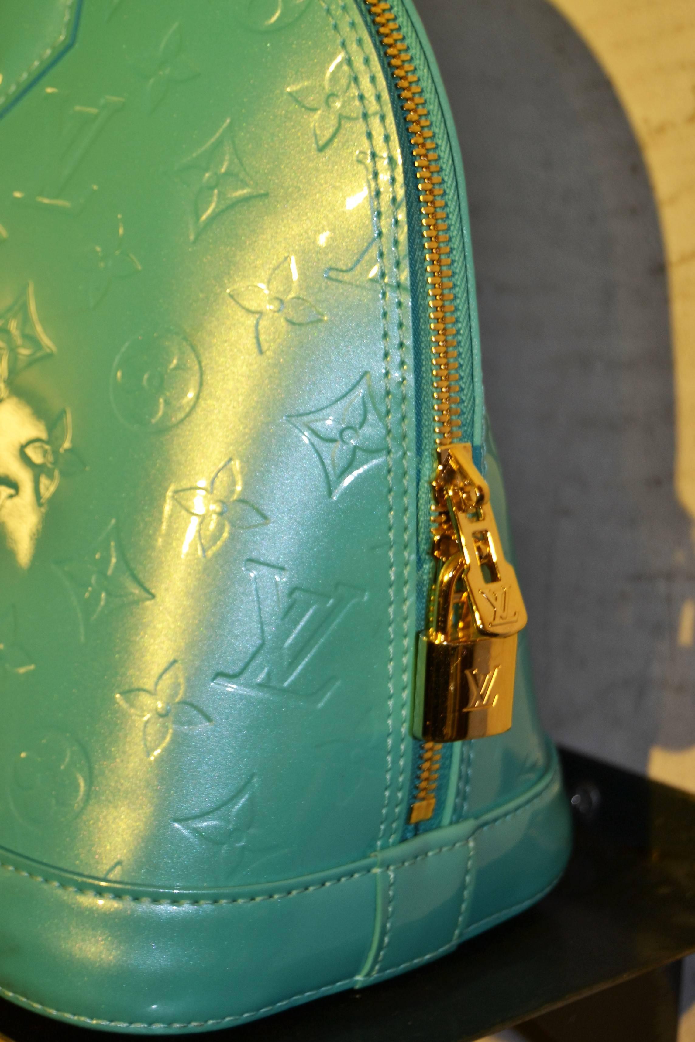 2000s Louis vuitton light green alma bag 1