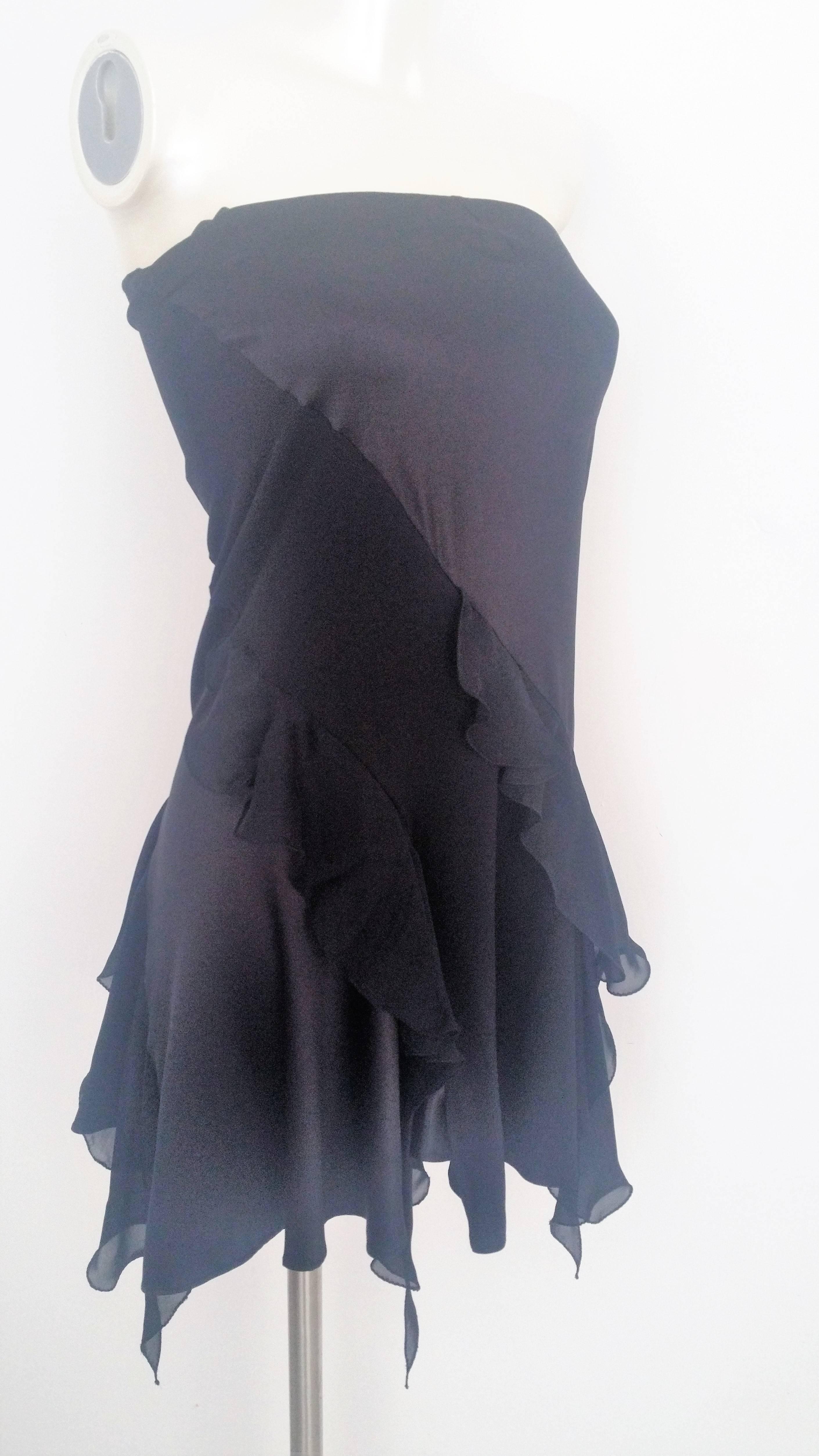 1990s Roberto Cavalli black dress NWOT
It can be worn as a skirt or as a mini dress still with tags
retail price 1200 € 