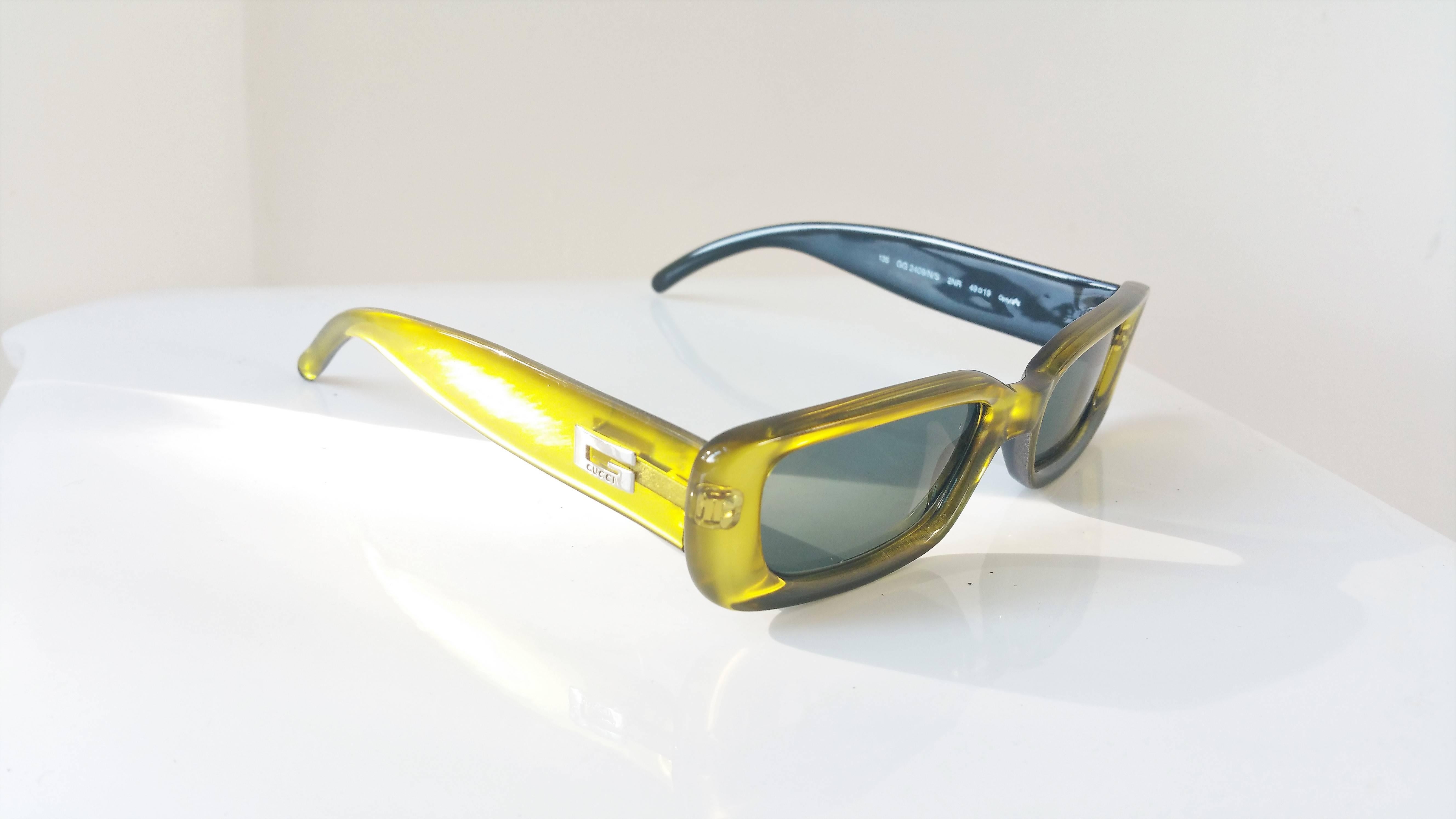 Black 1990s Gucci yellow sunglasses