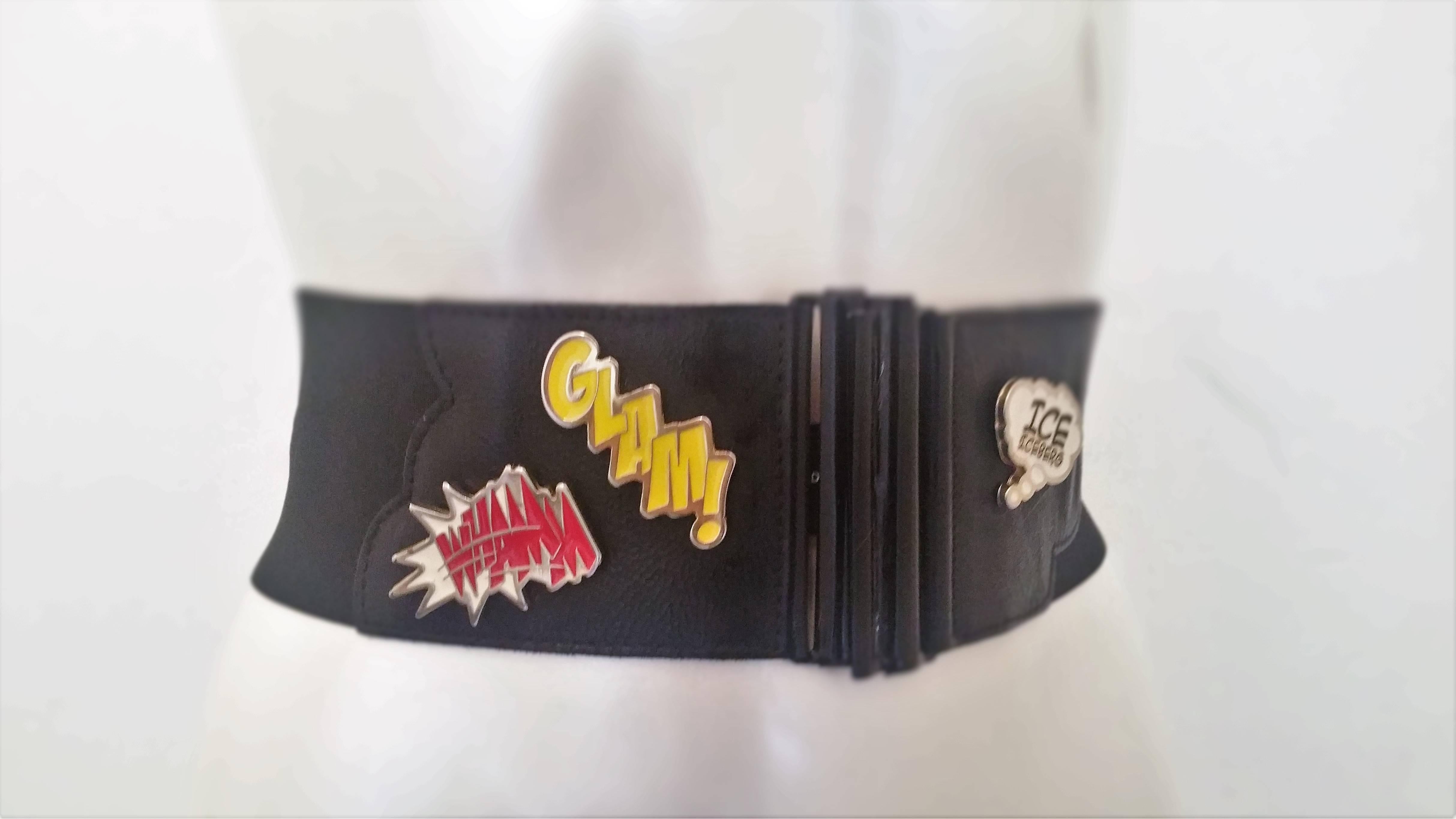 20002 Iceberg black belt with designs on it
left size: Ice Iceberg hardware 
right side: Glam in yellow and whamm white and red hardware

total lenght 78cm when not stretched

please see carefully pictures 

