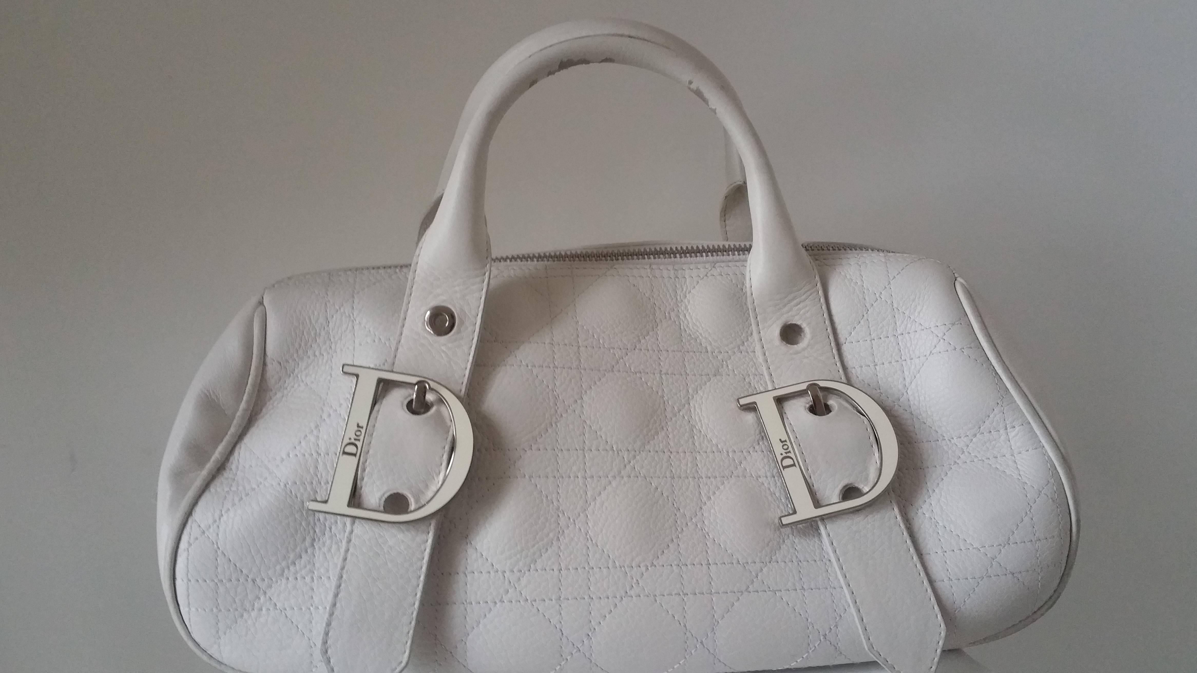 1980s Christian Dior White bag still with authenticity cards inside in prompt condition.
Silver hardware 
