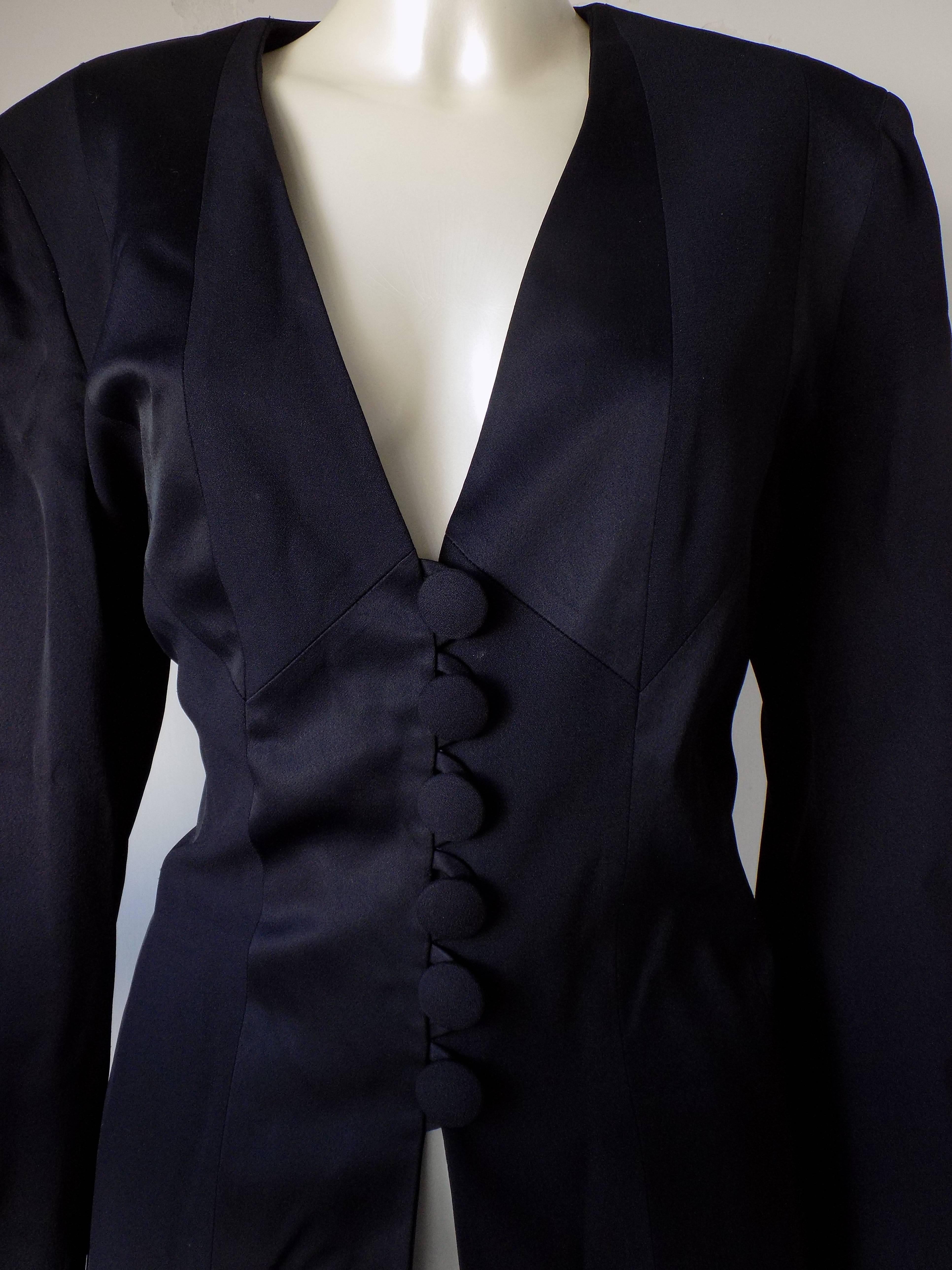 1970s Moschino Cheap & Chic black jacket 
6 black bottons on the front

Totally made in italy

Size: 48 italian size range

composition: 79 acetate 21 rayon
lining 100 rayon