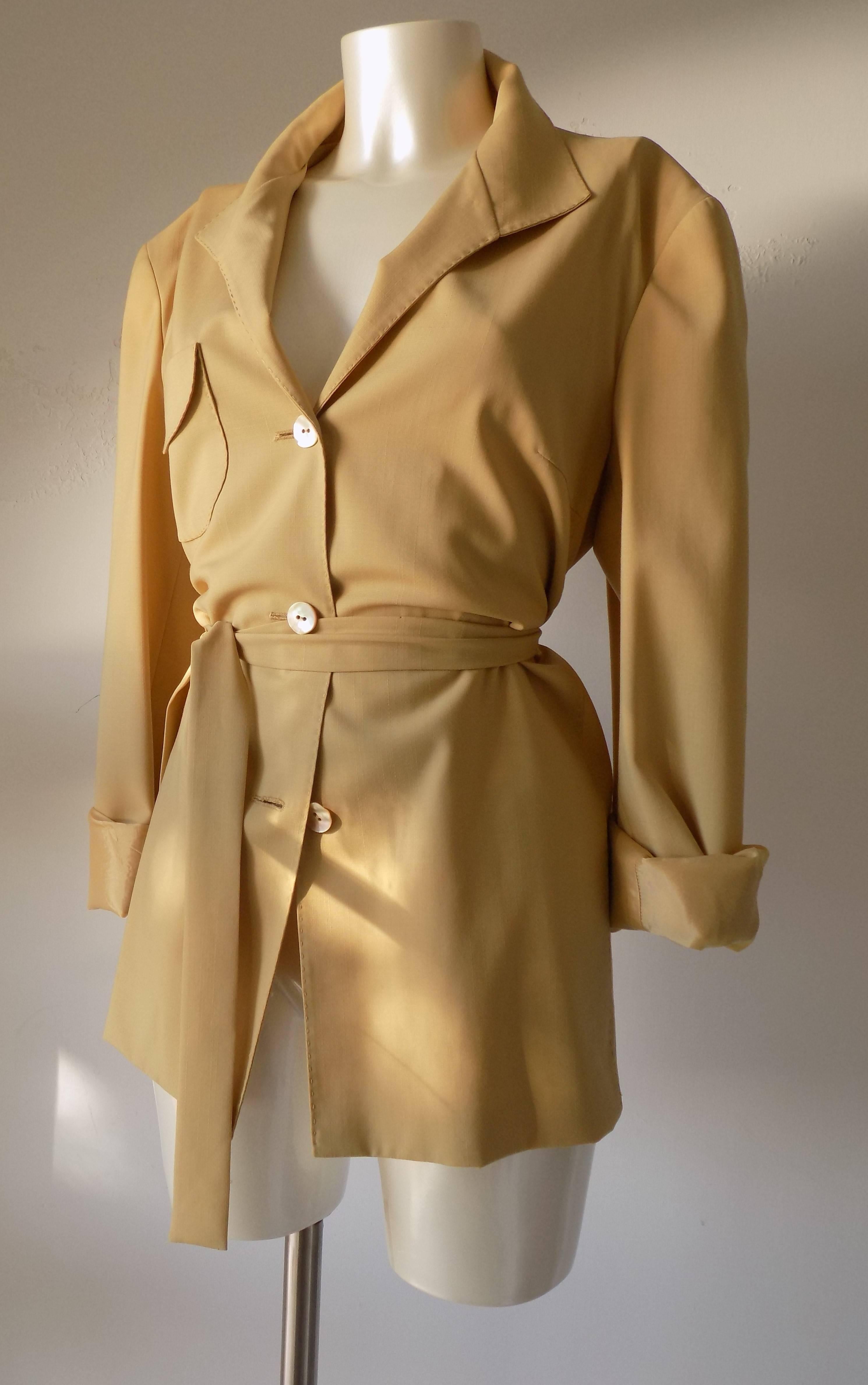 1980s Genny by Gianni Versace light brown wool jacket in italian size range 48
totally made in italy
100 wool