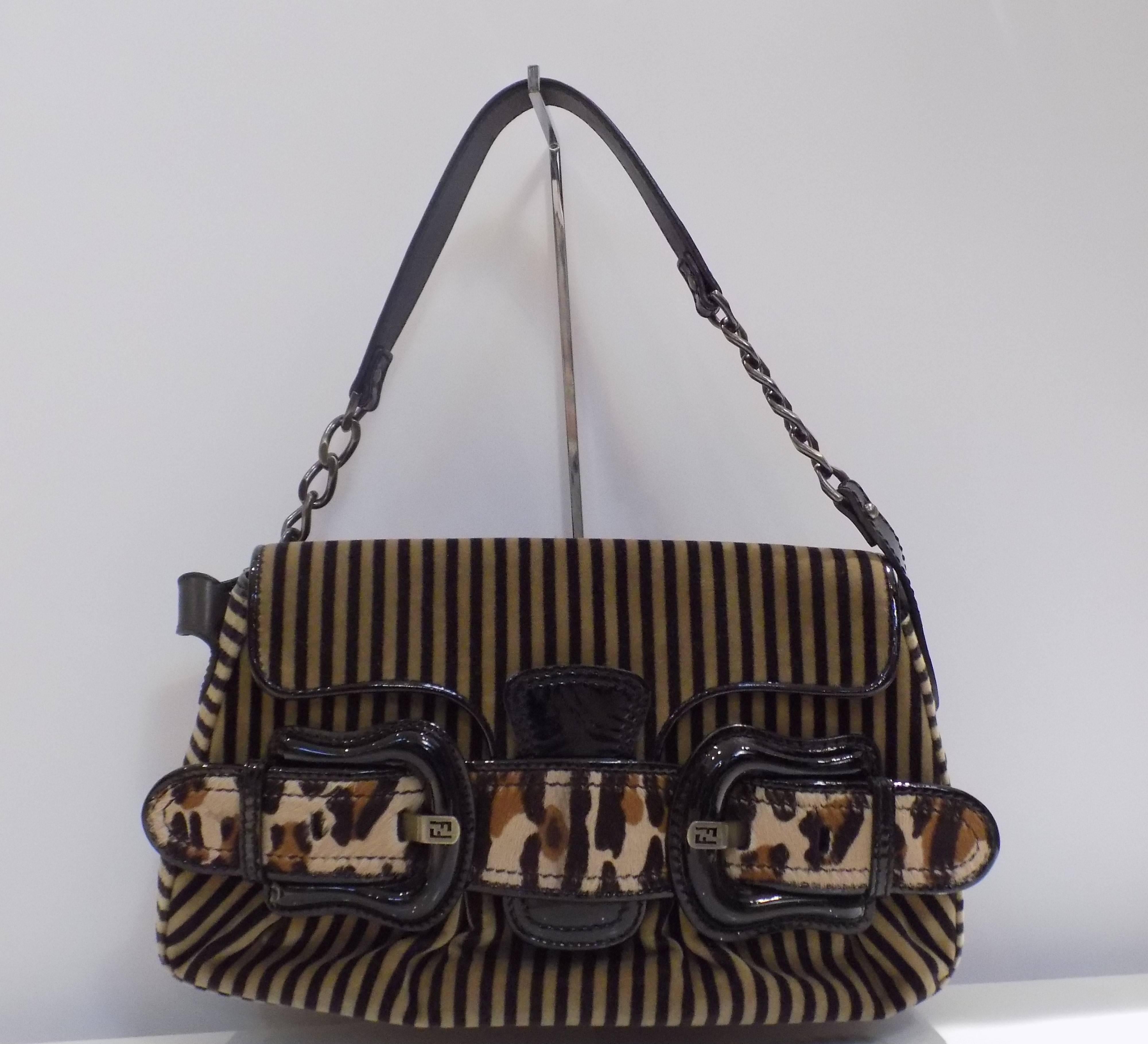1990s Fendi Pony Hair Bag

In perfect condition

Total Bag lenght: 33cm