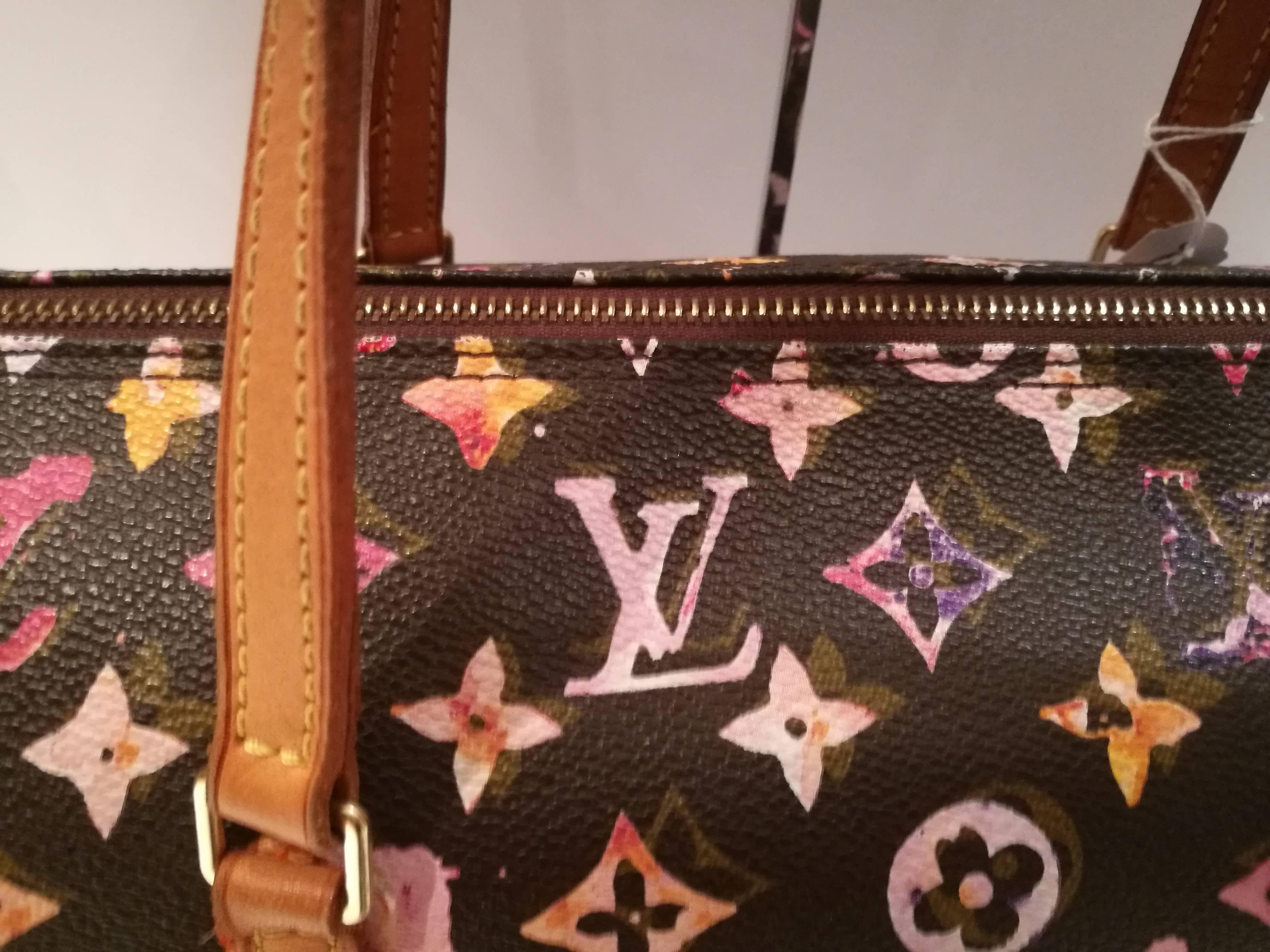 Authentic Louis Vuitton Watercolor Papillon Bag by Marc Jacobs and Richard Prince Limited Edition
 
Brand New Limited Edition

 
Material: Watercolor monogram canvas and natural cowhide
 
No interior pocket
 
Cowhide handles and top zipper