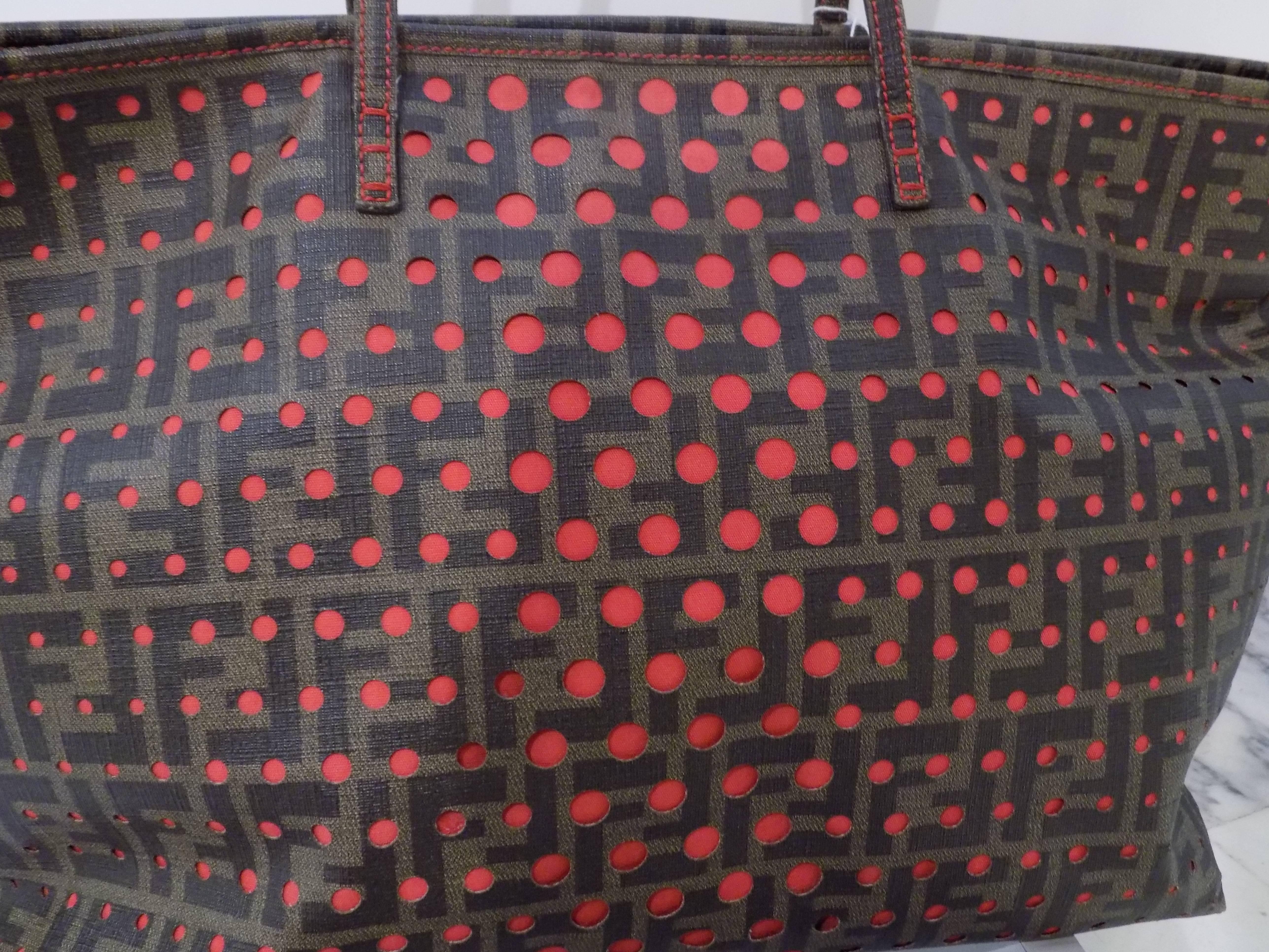 Fendi Monogram Perforated Leather Bag
Inside Red tone
Totally madei n italy