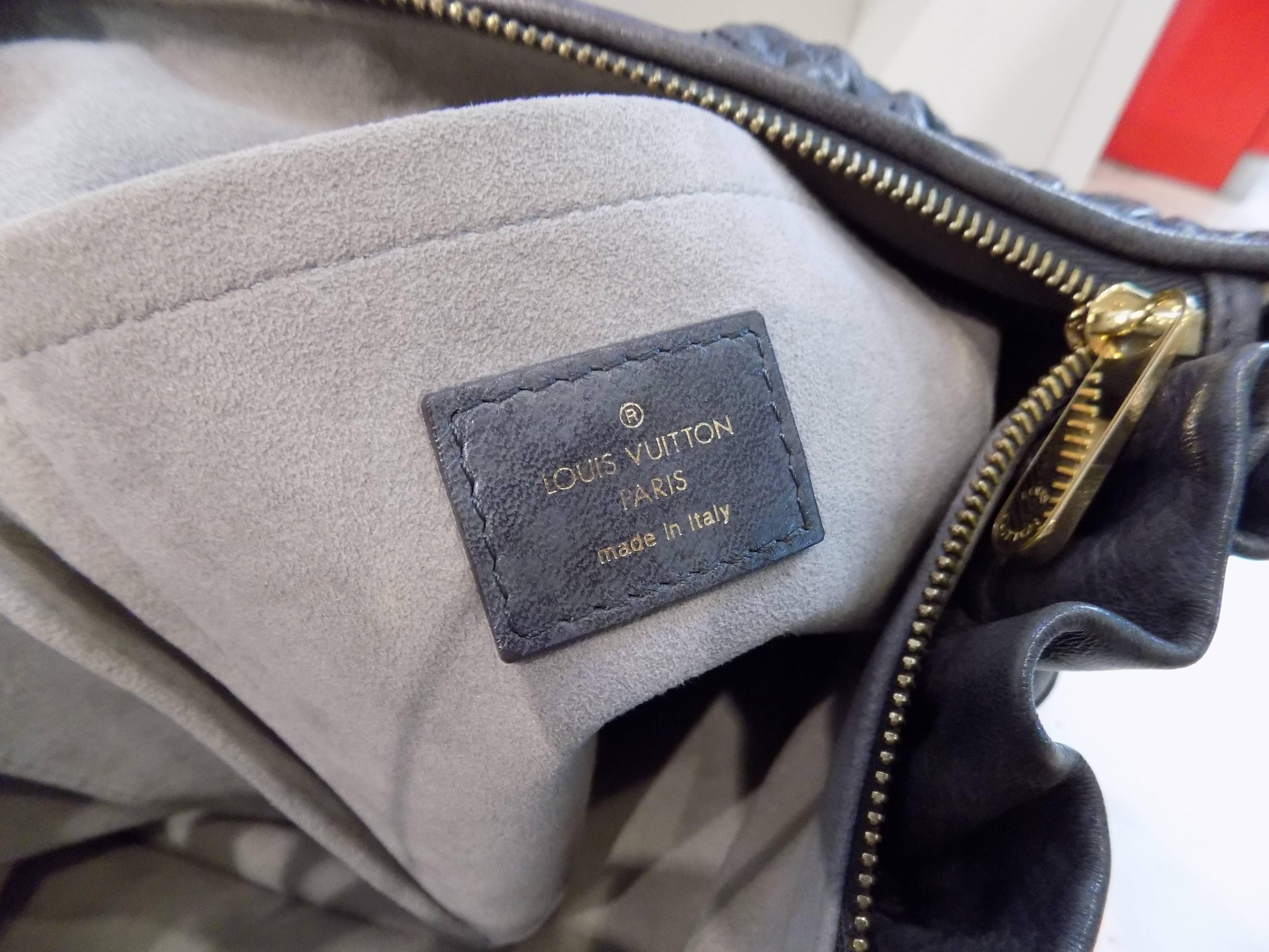 Louis Vuitton Grey Leather bag In New Condition In Capri, IT