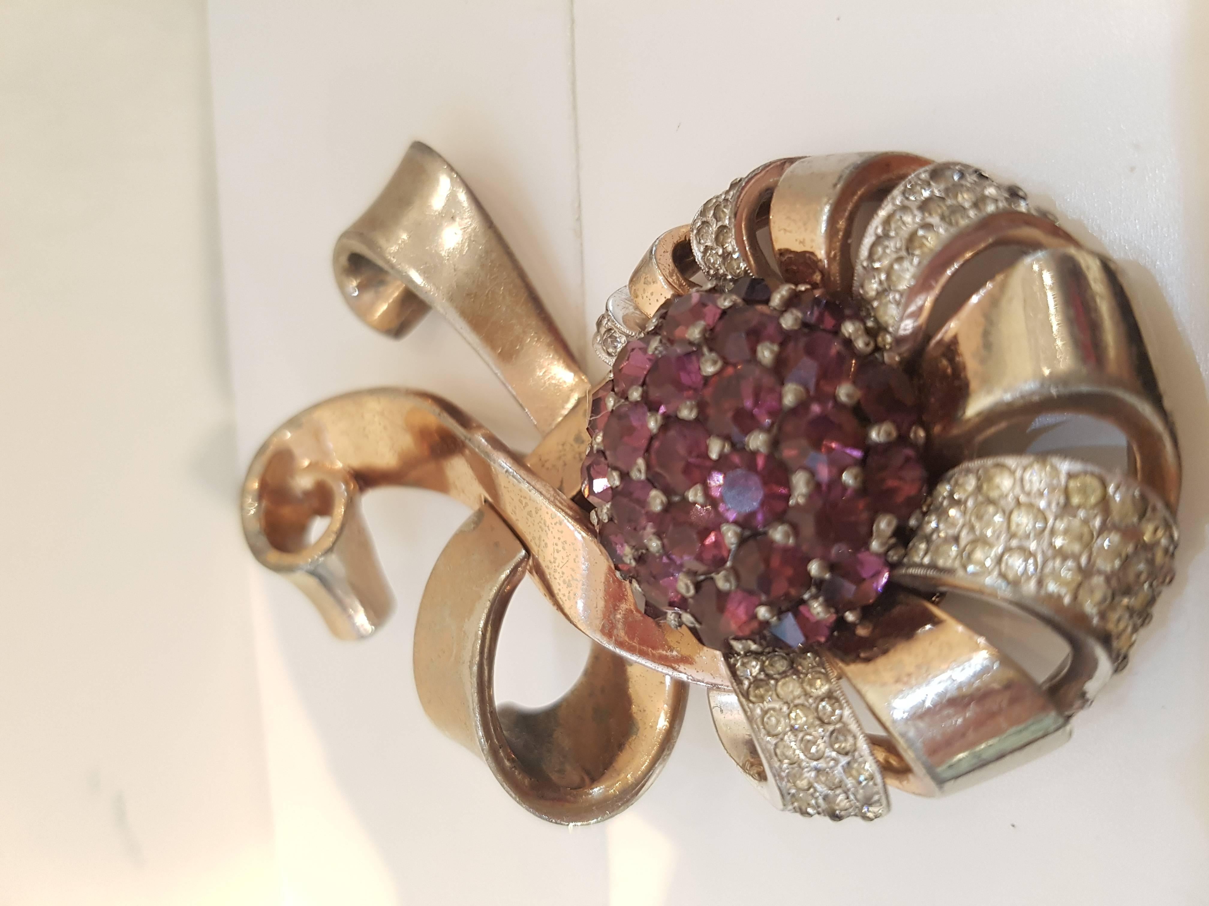 1970s Pennino Vintage Brooch

silver and pale rose tone with purple and crystal tone stones