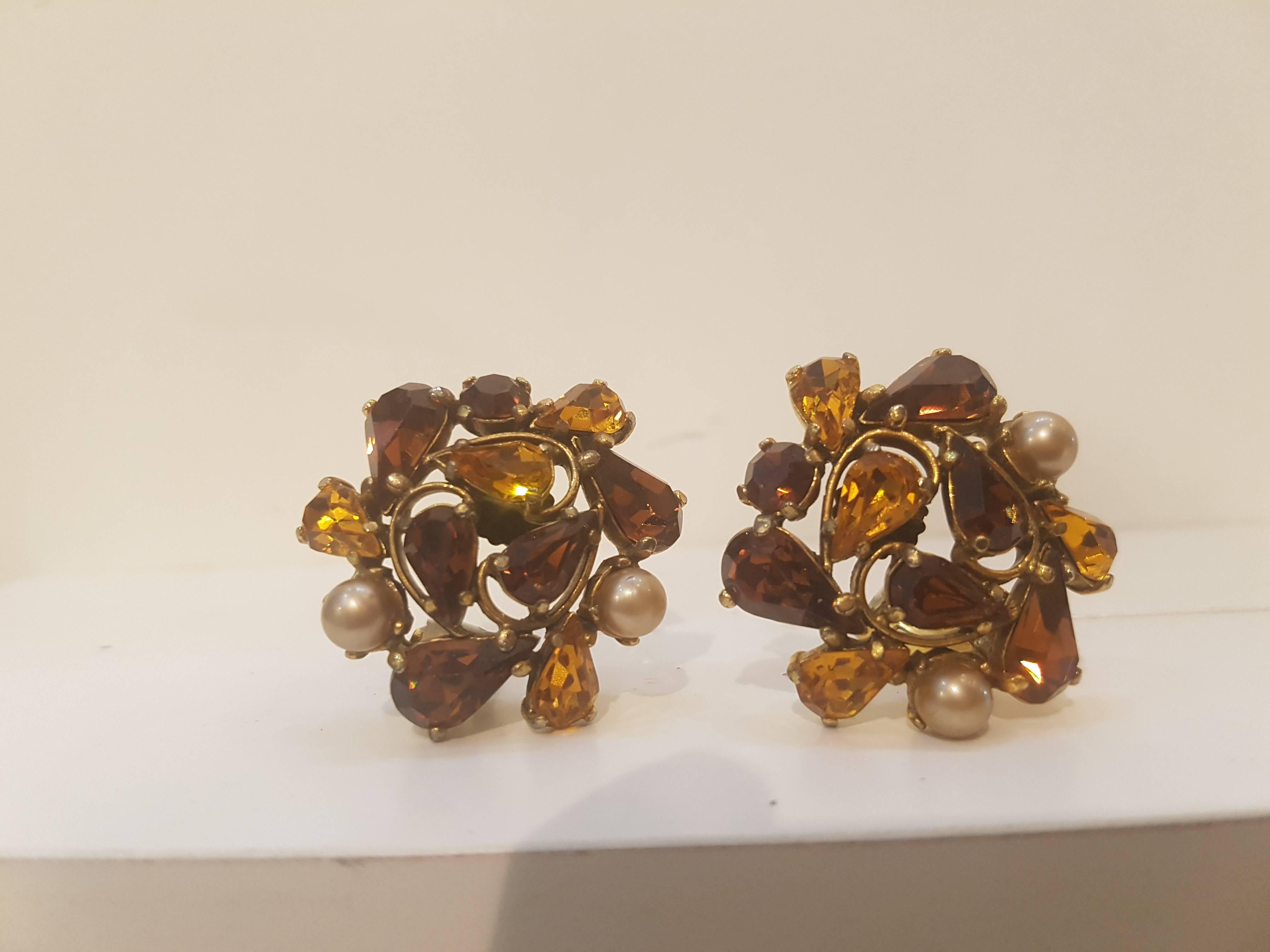 1980s Elsa Schiaparelli clip-on earrings
Gold tone hardware amber tone semipreciuous stone faux pearls
size 3.5 cm x 3.5 cm