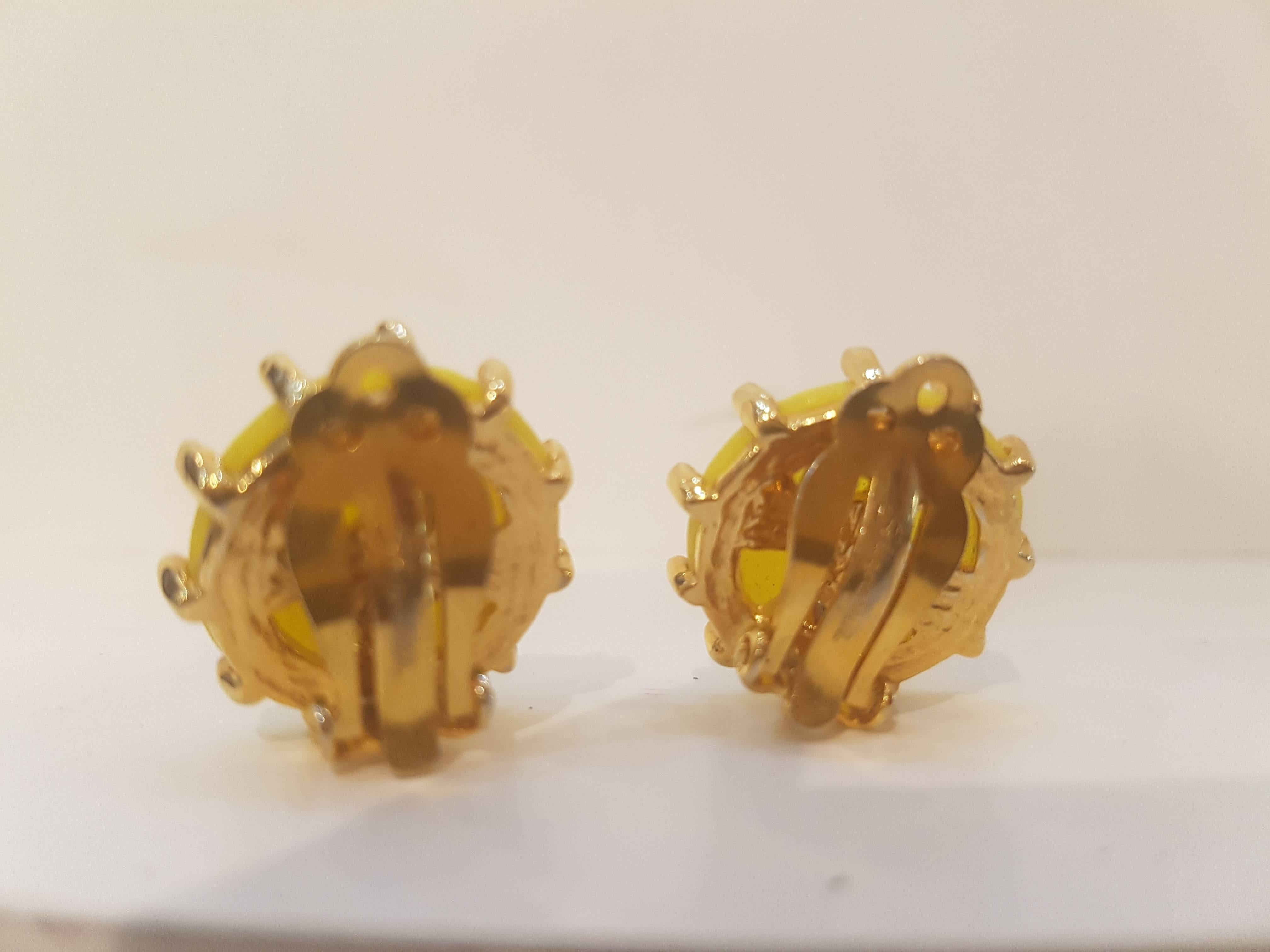 Women's or Men's 1980s Elsa Schiaparelli yellow clip-on earrings
