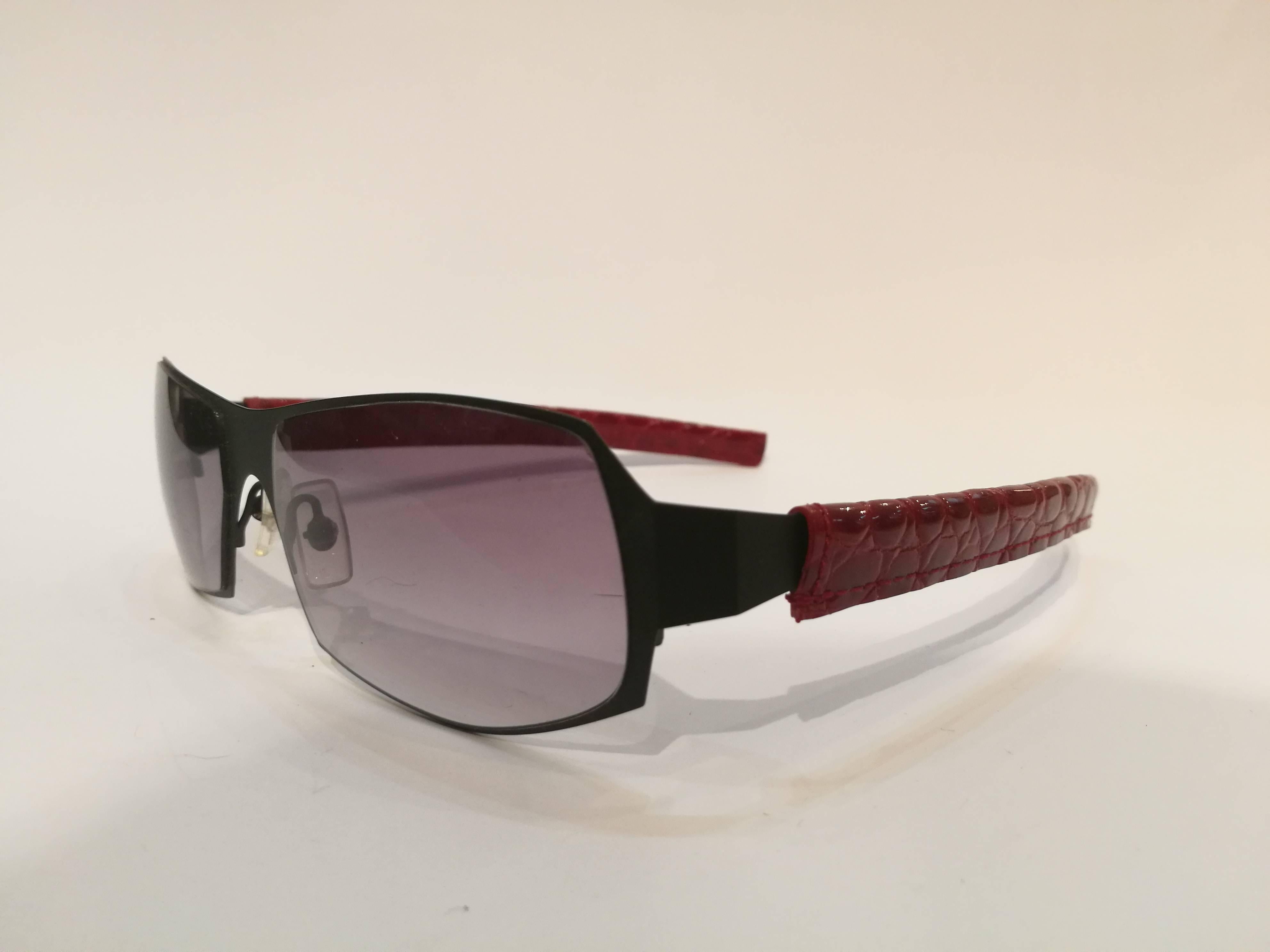 Less Than Human Sunglasses

Black tone with red removible python skin 