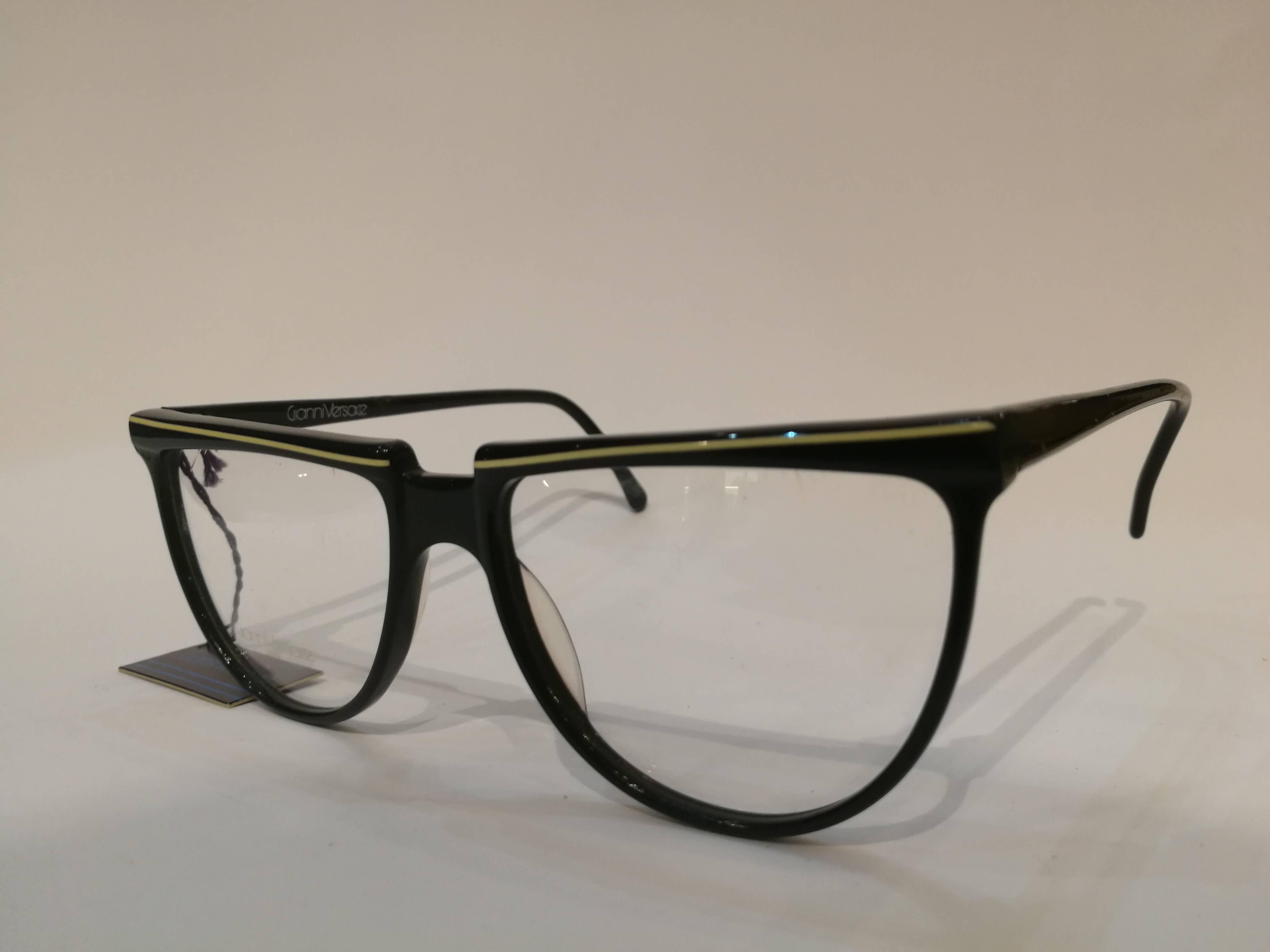 Beige Gianni Versace black frame glasses