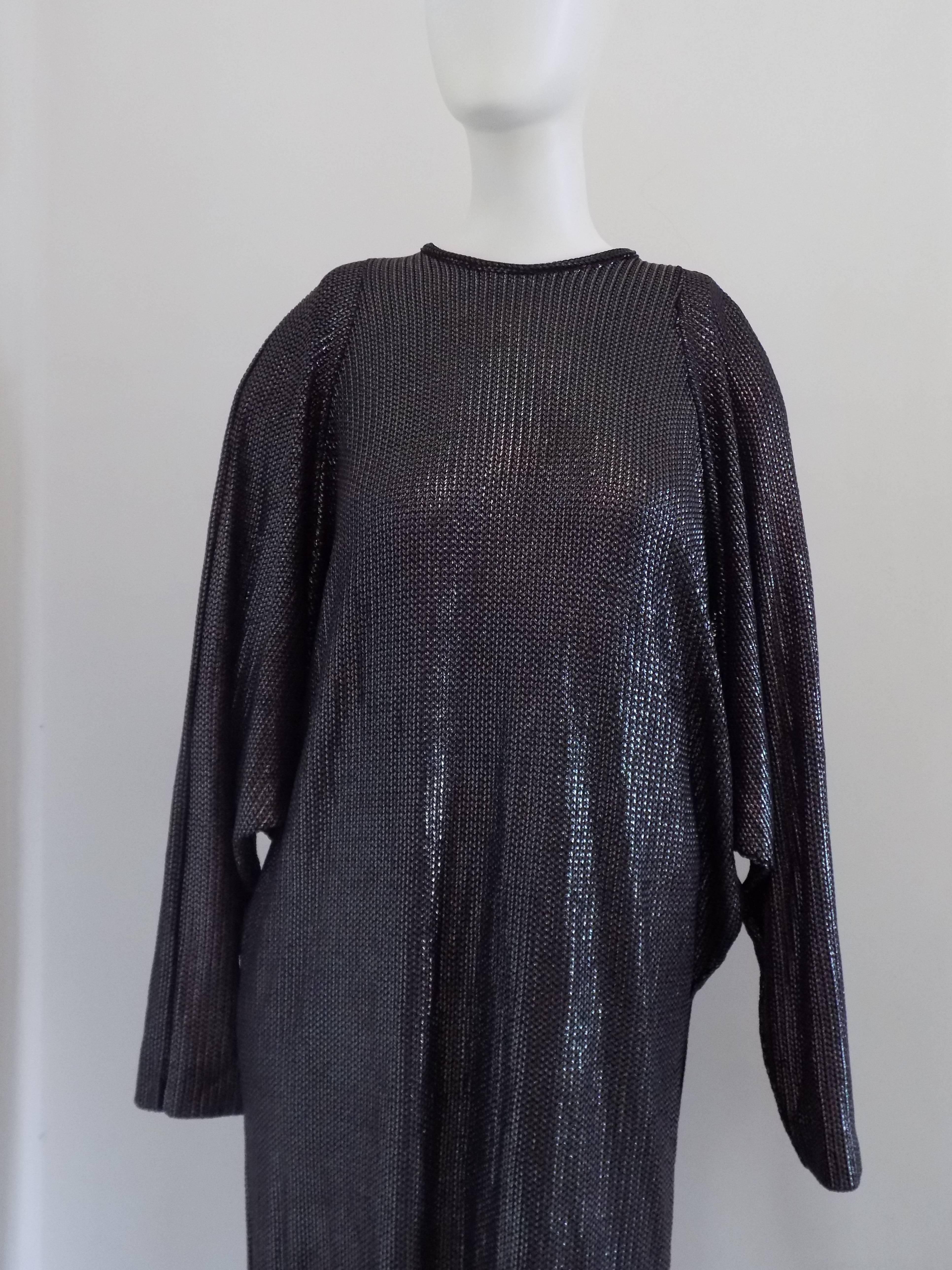 Vintage Metallic Dress

Dark anthracite long dress
totally made in italy
no more labels and tags