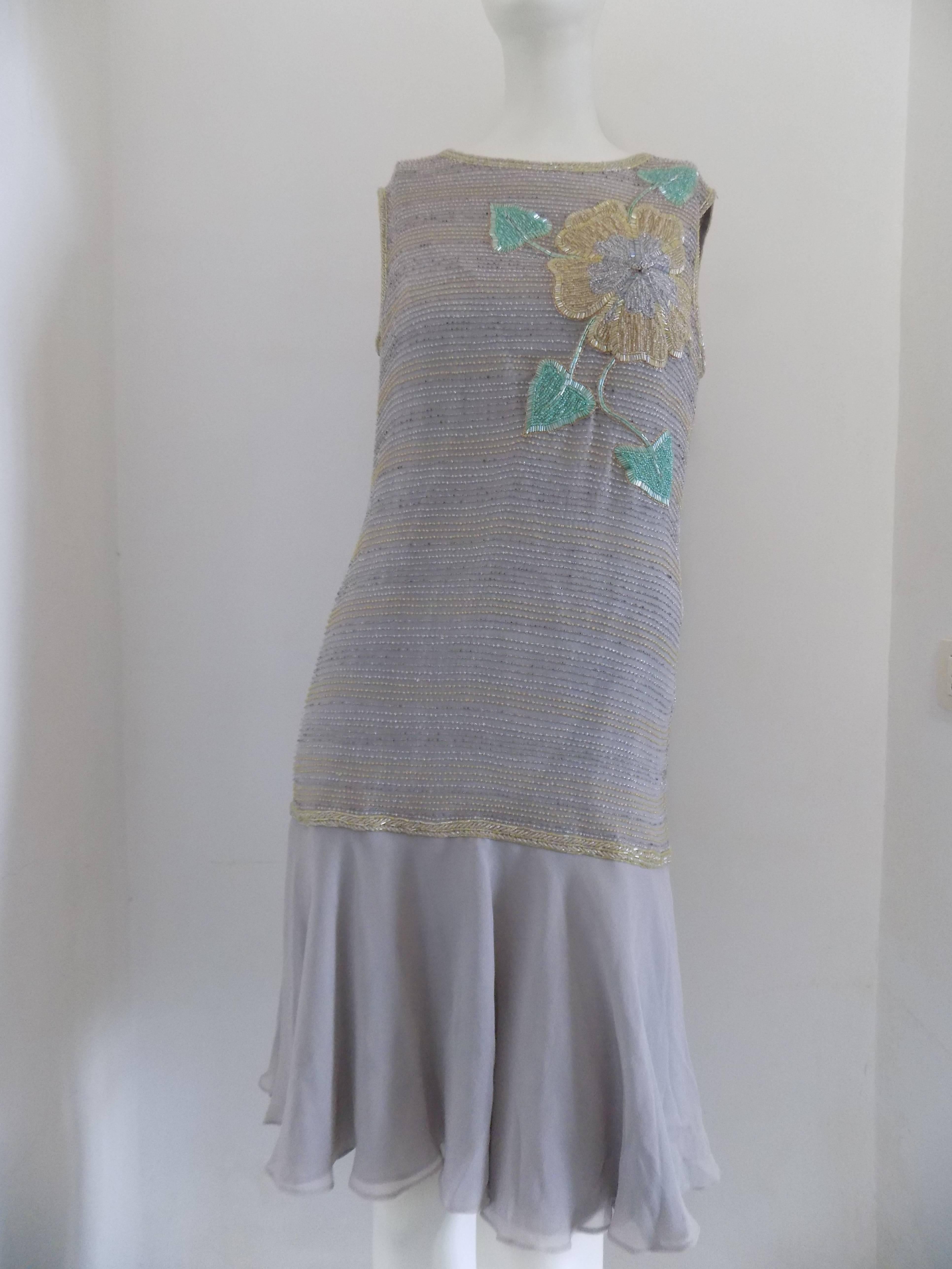 simon and cailand's grey long dress
totally made in france in italian size range 42
100% silk