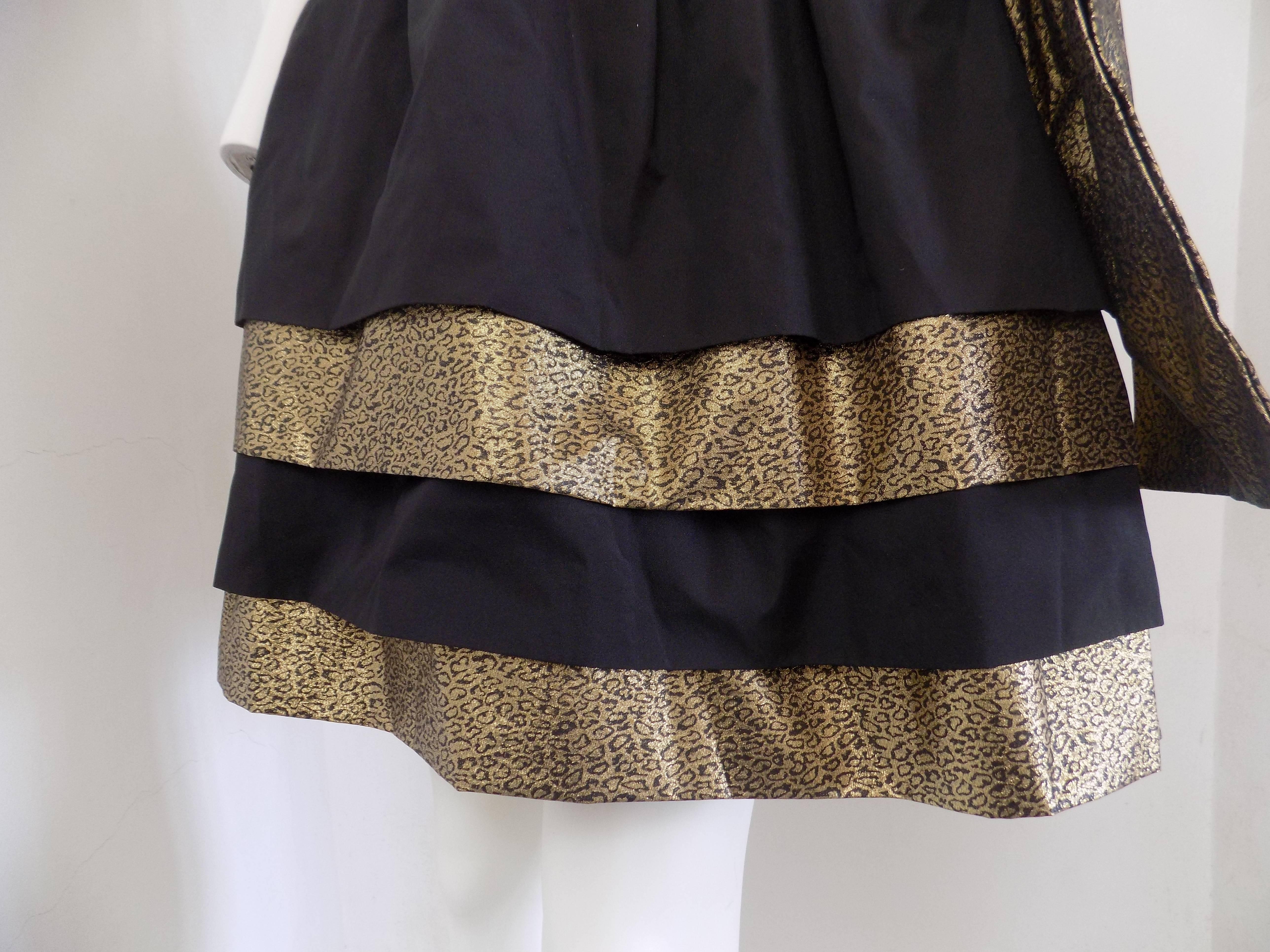 Boutique Lucia milano dress
gold and black velvet dress with belt
size 42