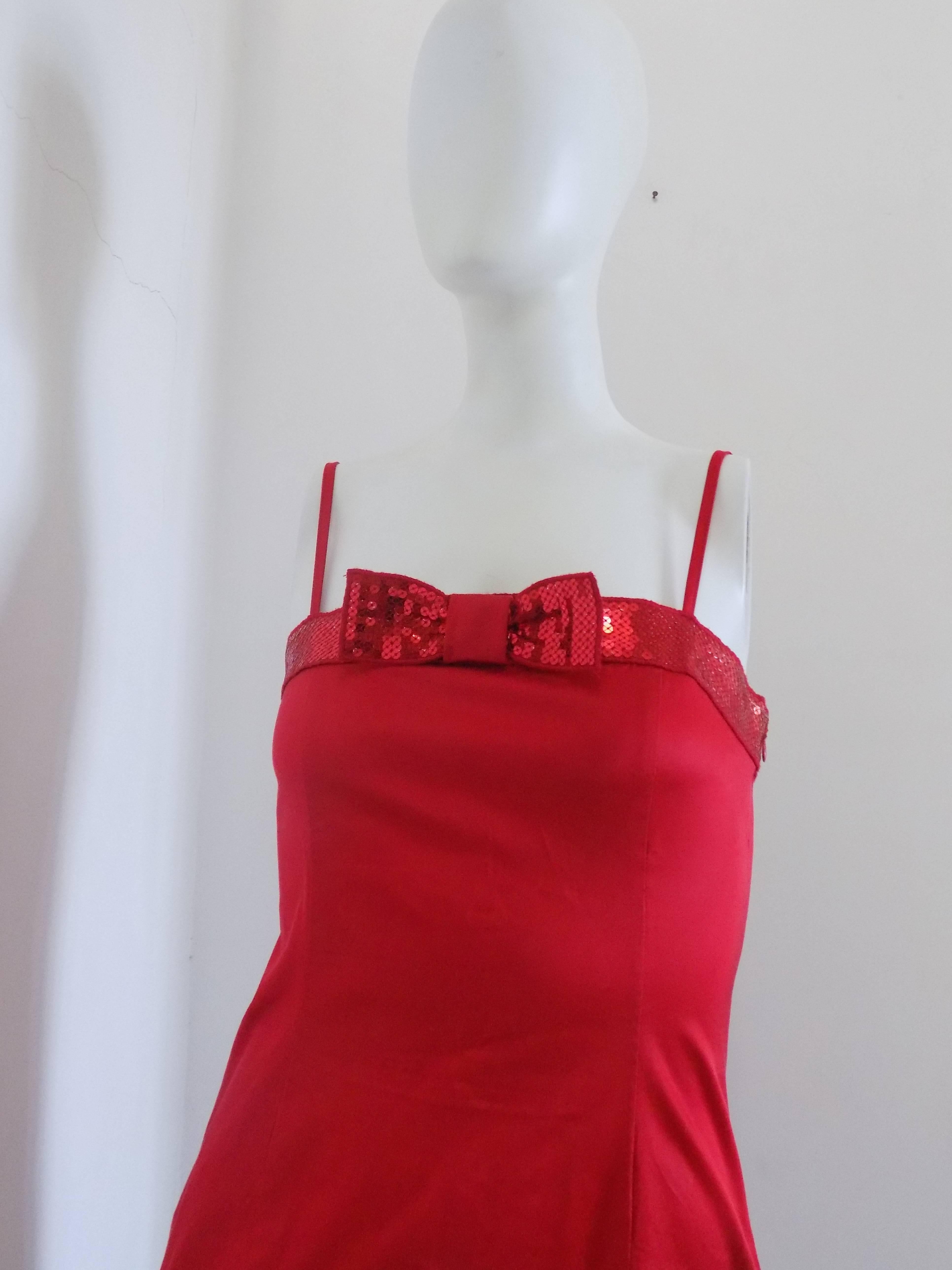 1990s Moschino Jeans red sequins dress

Totally made in italy in italian size range 44 but fits smaller