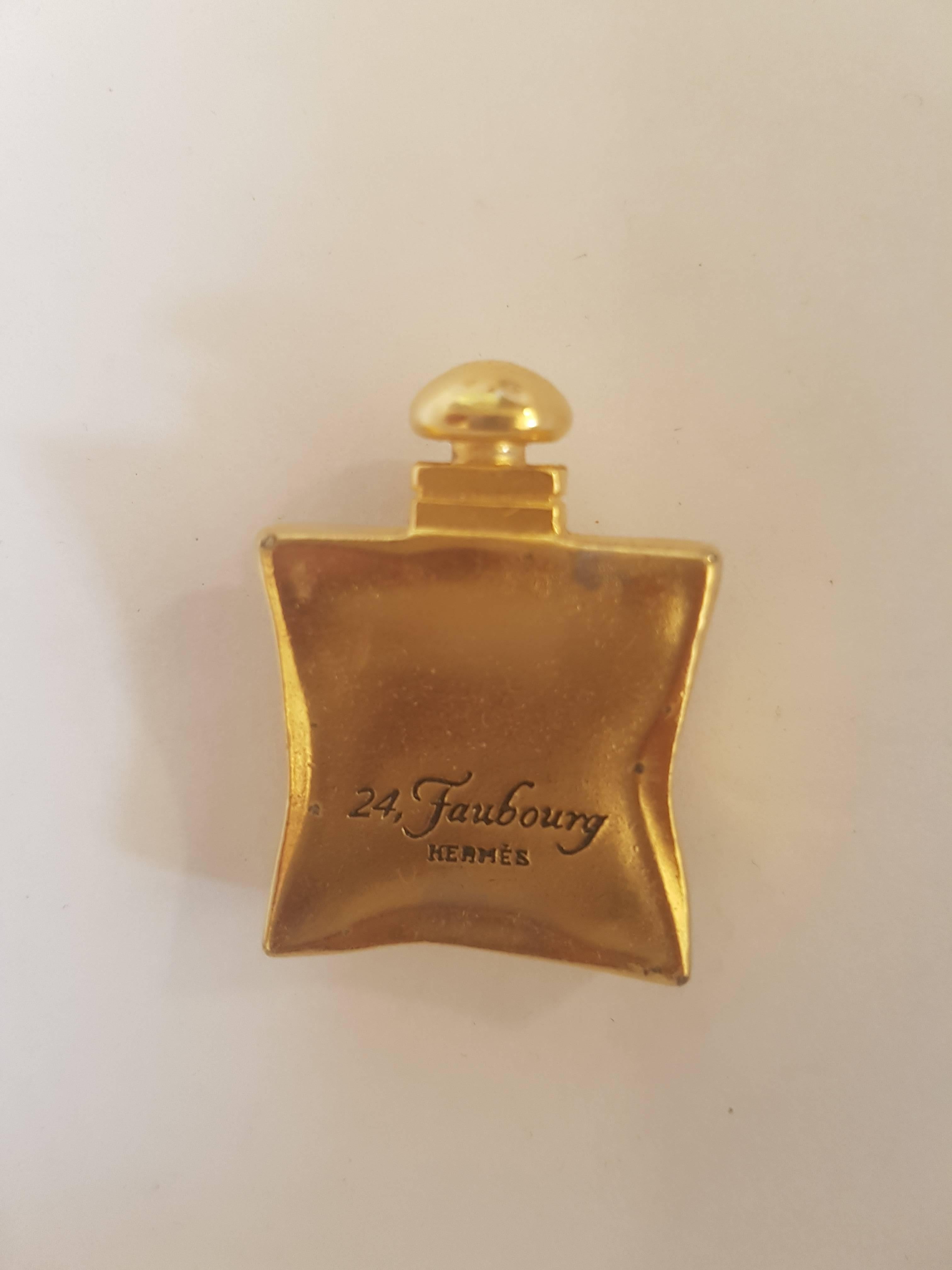 Women's or Men's Hermes Gold tone Brooch Pin